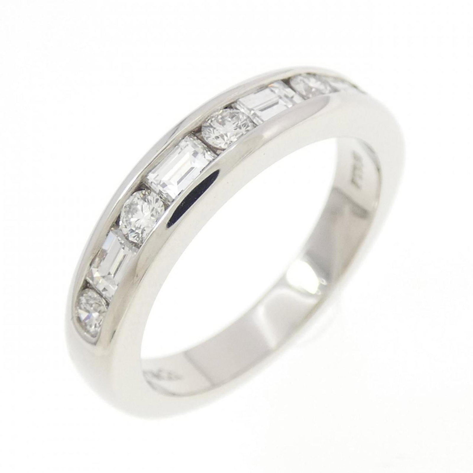 Platinum ring by Tiffany band: Platinum ring by Tiffany band Platinum ring by Tiffany features a diamond stone set in a band design. The item is made from platinum and has a us size of 4, with some minor scratches and dirt visible
