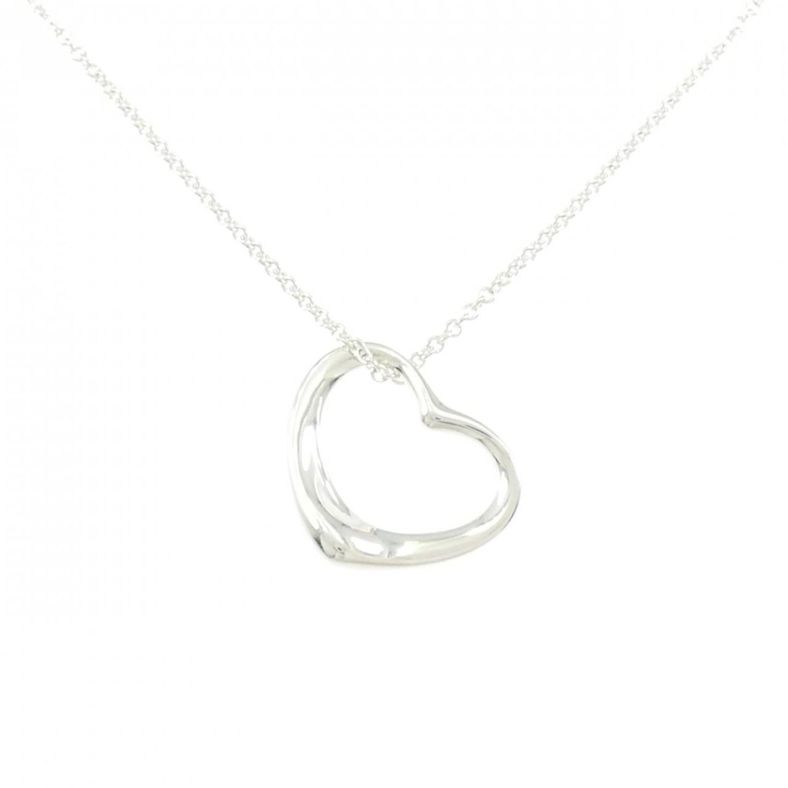 Heart Open Tiffany Necklace: Heart Open Tiffany Necklace Silver 925 Heart Open Tiffany Necklace with a pendant size of 20.2mm x 19.5mm, available in a 41 cm / 16.14'' circumference. This necklace features a heart-shaped design ma