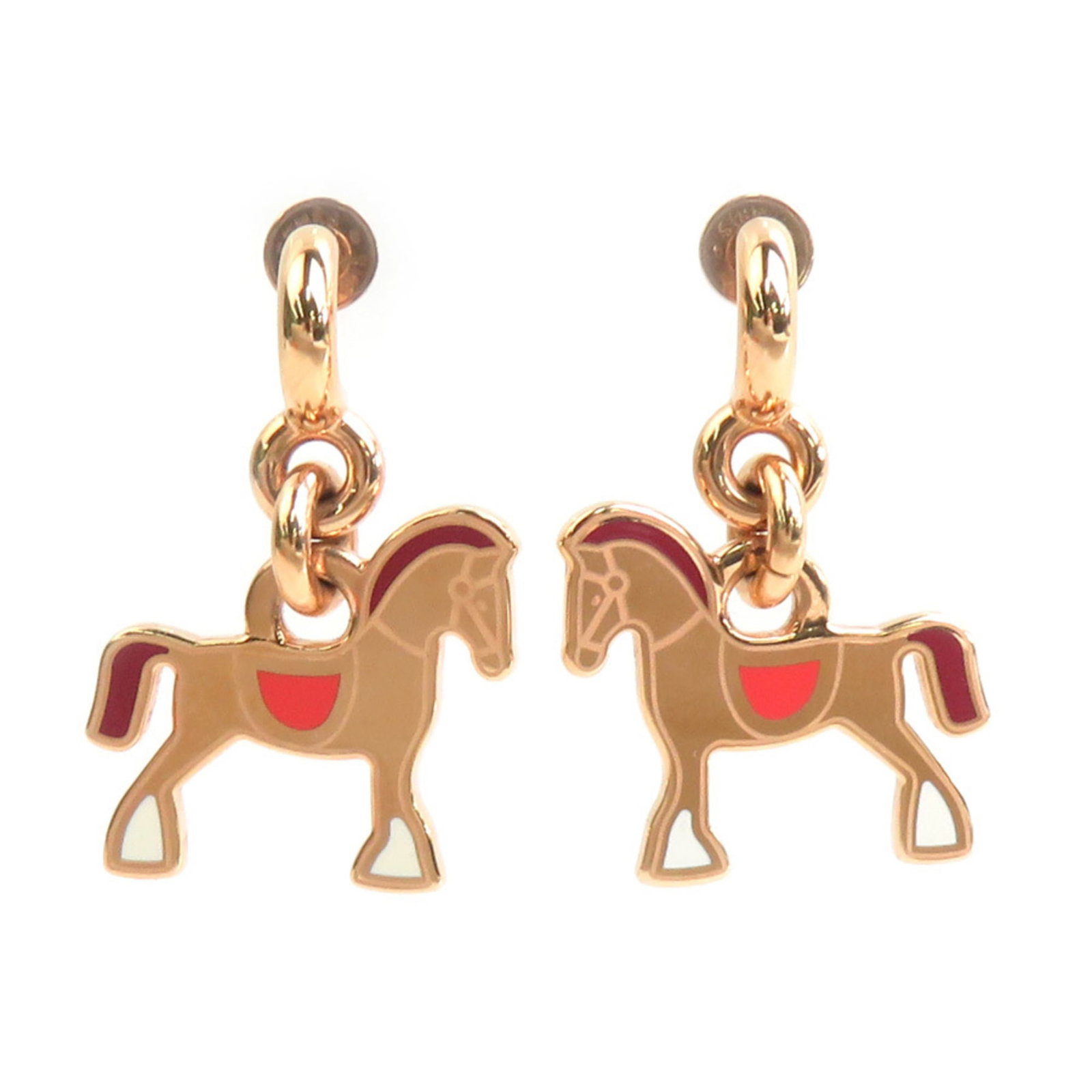 Metal Hermes Drop Earrings: Metal Hermes Drop Earrings Rose gold metal Hermes drop earrings in excellent condition, with some minor scratches and dirt. The earrings measure 34mm x 21mm and feature a classic design that adds a to