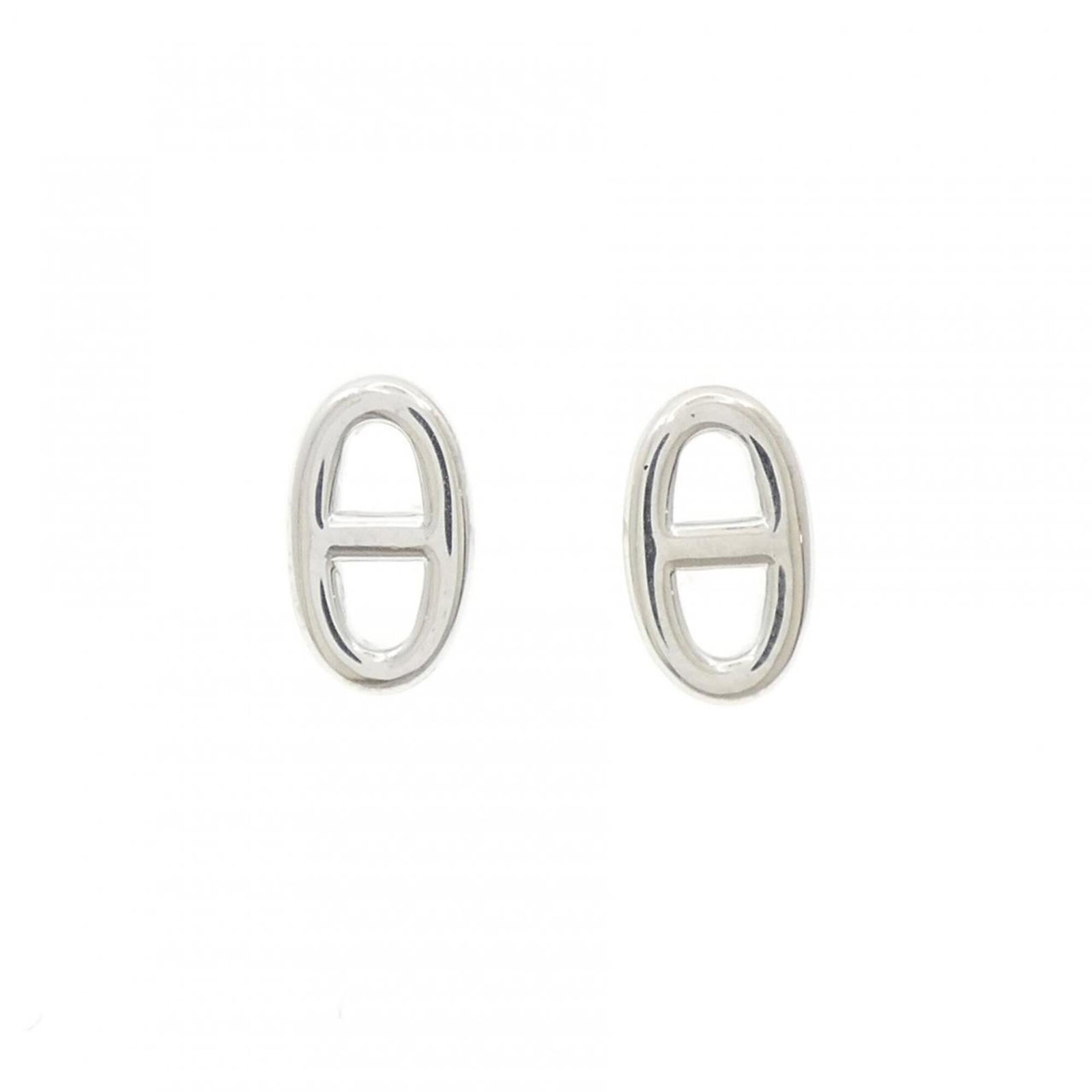 Hermes 925 Silver Earrings Stud: Hermes 925 Silver Earrings Stud 925 Silver Earrings Stud by Hermes, featuring elegant stud earrings with a subtle design. Made from high-quality silver, these earrings showcase a sophisticated touch t