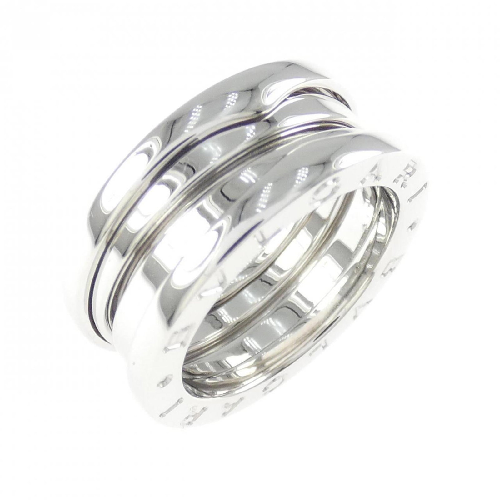 Bvlgari Band Ring White Gold (18K): Bvlgari Band Ring White Gold (18K) Bvlgari Band Ring White Gold (18K) features a sleek and sophisticated design, crafted from high-quality white gold. The ring boasts a classic band style that exudes