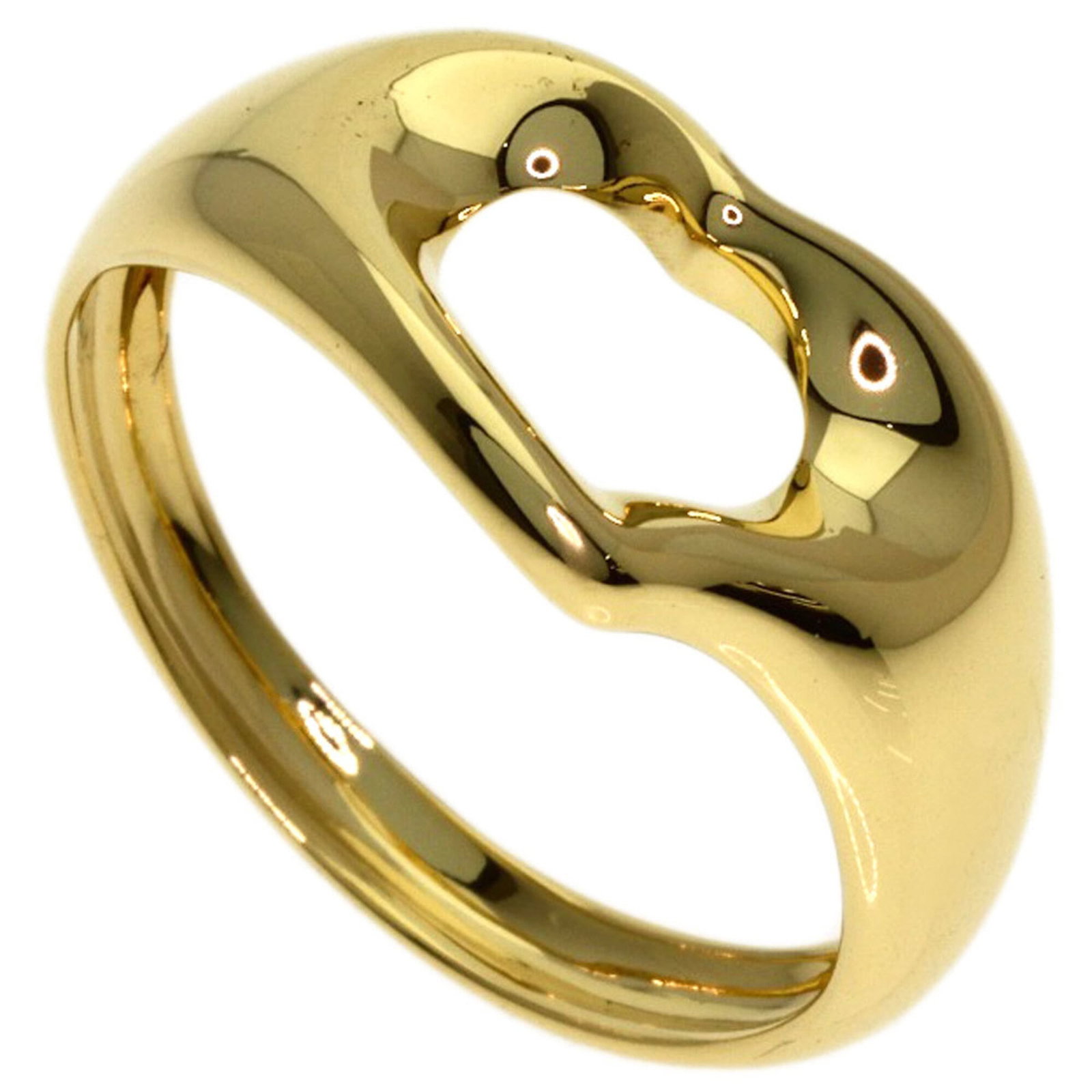 Tiffany Band Ring: Tiffany Band Ring Yellow gold band ring from Tiffany, featuring 18K metal and a US size 6. The ring bears some minor scratches and dirt, but remains in very good condition despite its used state. Weig
