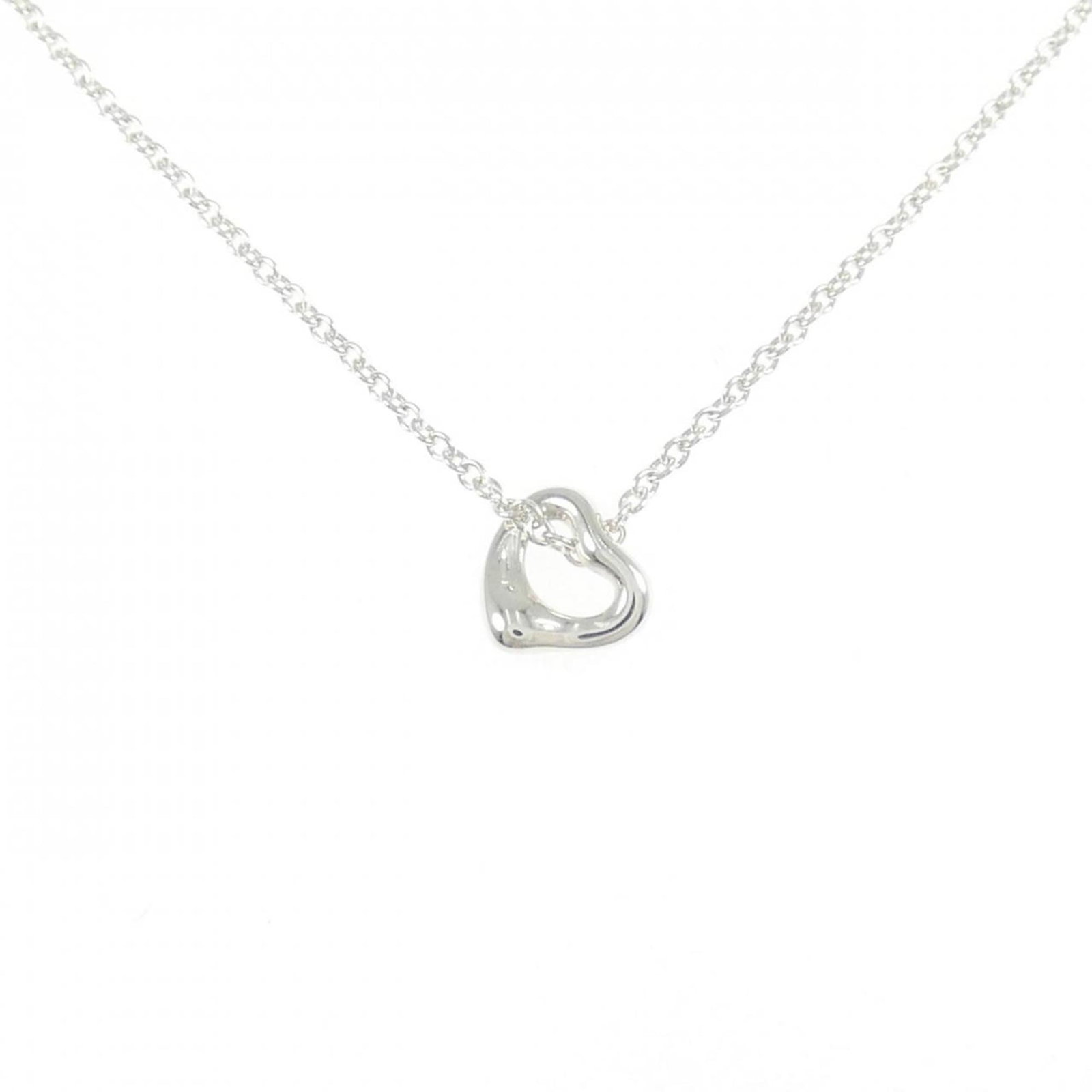 Heart Open Tiffany Necklace: Heart Open Tiffany Necklace Silver 925 Heart Open Tiffany Necklace, featuring a 6.9mm x 7mm pendant with a 41 cm / 16.14'' adjustable neck circumference, available in used condition with some traces