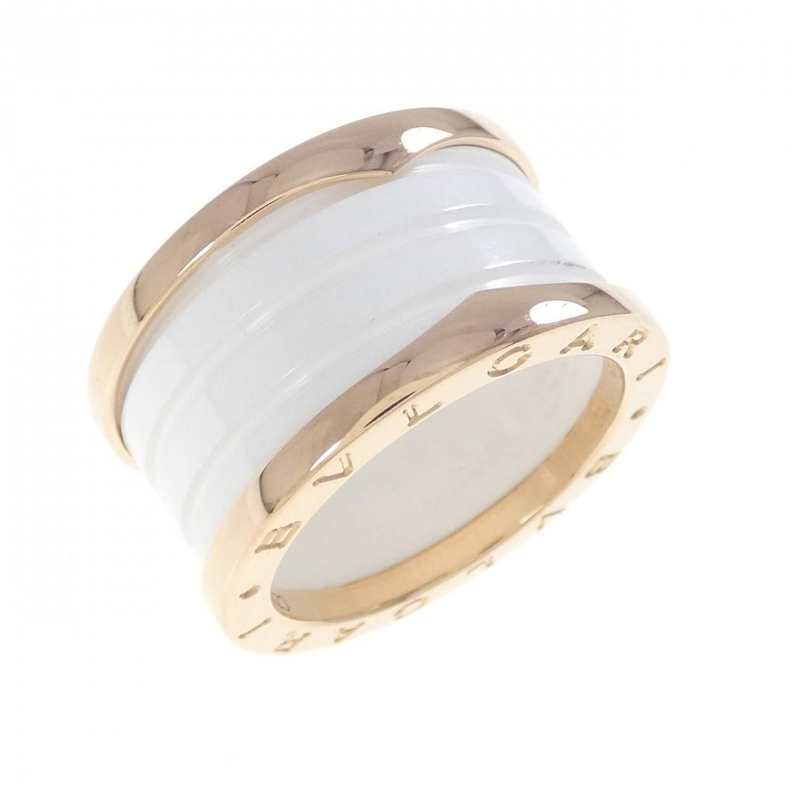 Pink Gold Ceramic Band Ring By Bvlgari: Pink Gold Ceramic Band Ring By Bvlgari Pink Gold Ceramic Band Ring By Bvlgari features a unique blend of ceramic and pink gold (18K) craftsmanship. With an elegant design and a comfortable fit, this b