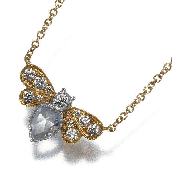 Necklace diamond garden bee yellow gold 18K white 750 Tiffany&Co: Necklace diamond garden bee yellow gold 18K white 750 Tiffany&Co Tiffany & Co.'s Enchant Garden Bee necklace showcases a stunning natural diamond surrounded by yellow gold, with an 18K white gold base