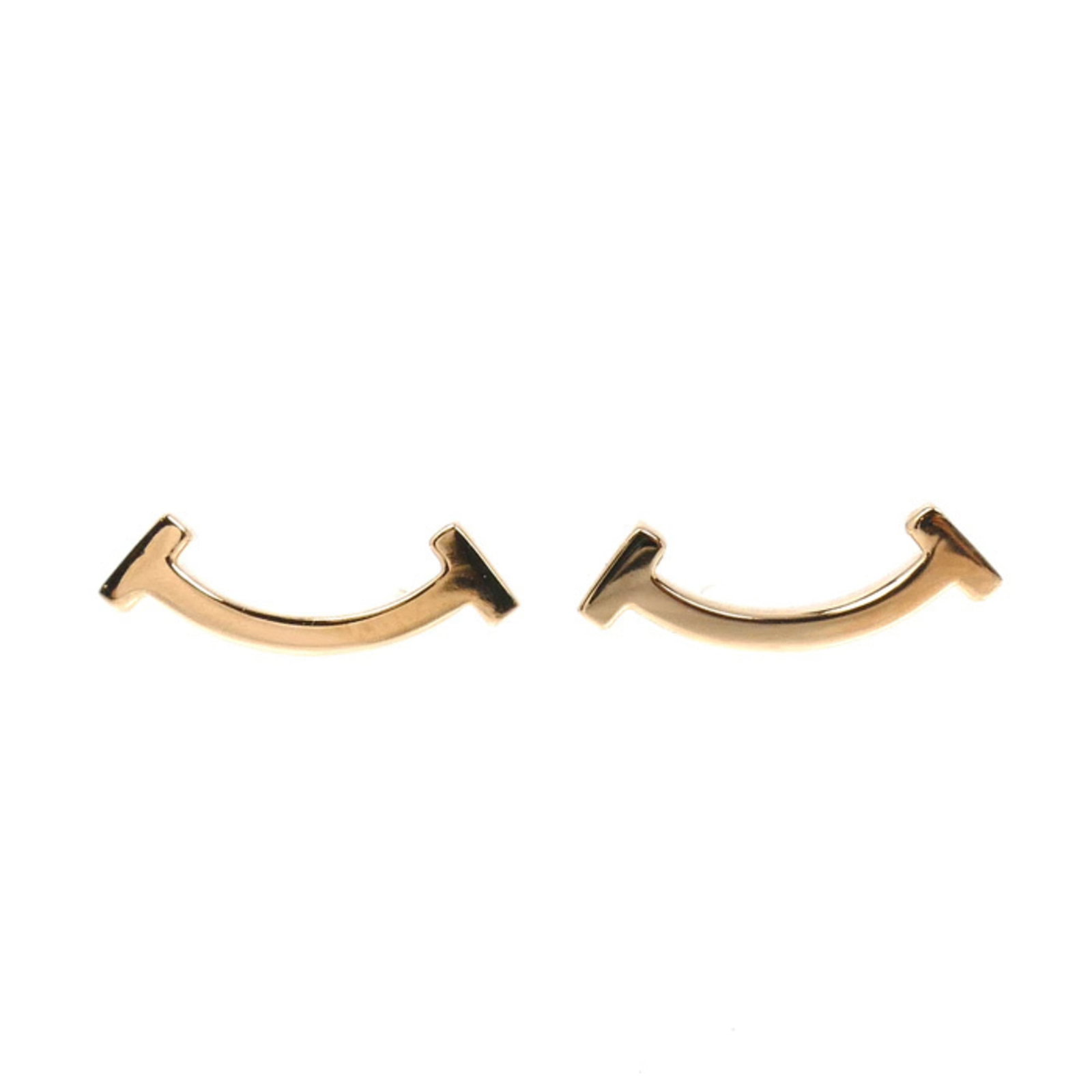 Gold Pink Tiffany Stud Earrings: Gold Pink Tiffany Stud Earrings Pink gold (18K) stud earrings from Tiffany, featuring a subtle pink hue. The earrings have a few traces of usage, with some minor scratches and dirt visible, but remain