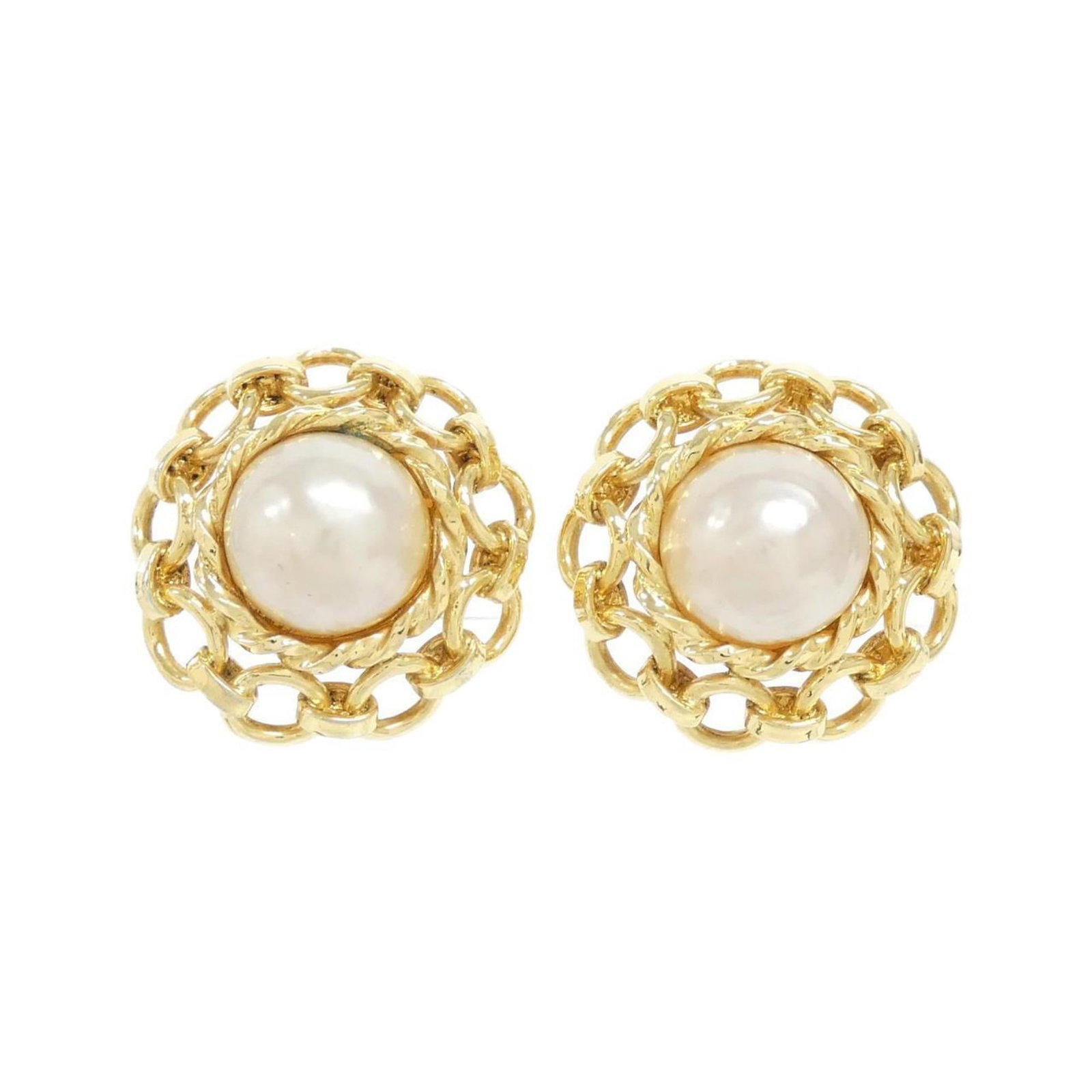 Chanel Clip Earrings: Chanel Clip Earrings Chanel Clip Earrings in Gold and White, featuring the iconic interlocking CC design, are a timeless accessory for women. With their sleek and minimalist design, these earrings add