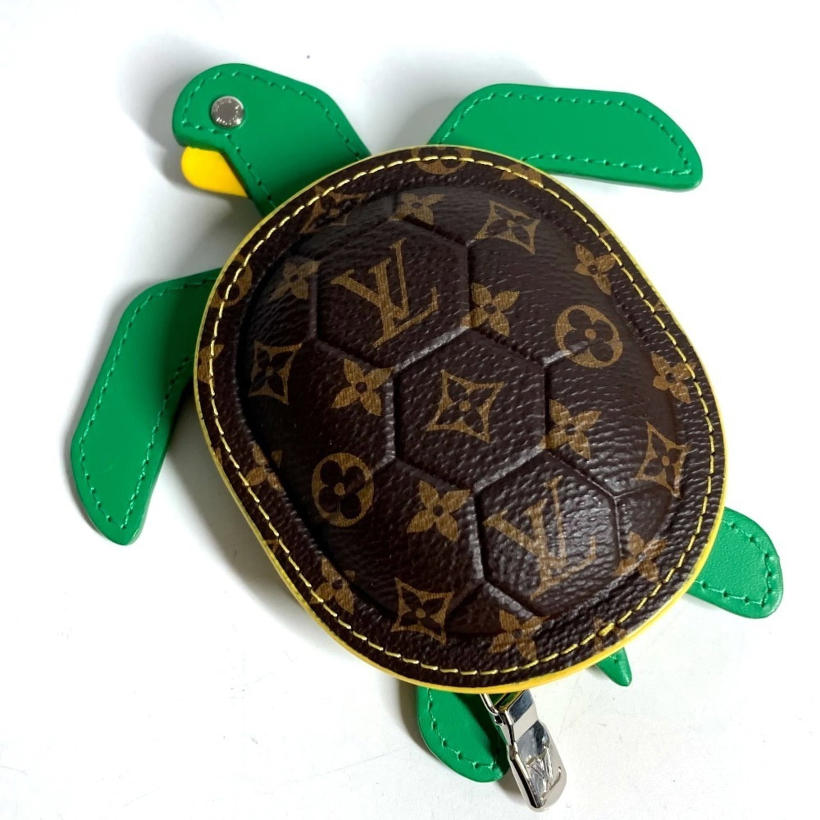 Canvas Leather Handbag Monogram Charm Louis Vuitton: Canvas Leather Handbag Monogram Charm Louis Vuitton Canvas, Leather, and Monogram details make this Louis Vuitton handbag charm stand out. The item features a unique combination of canvas, leather,