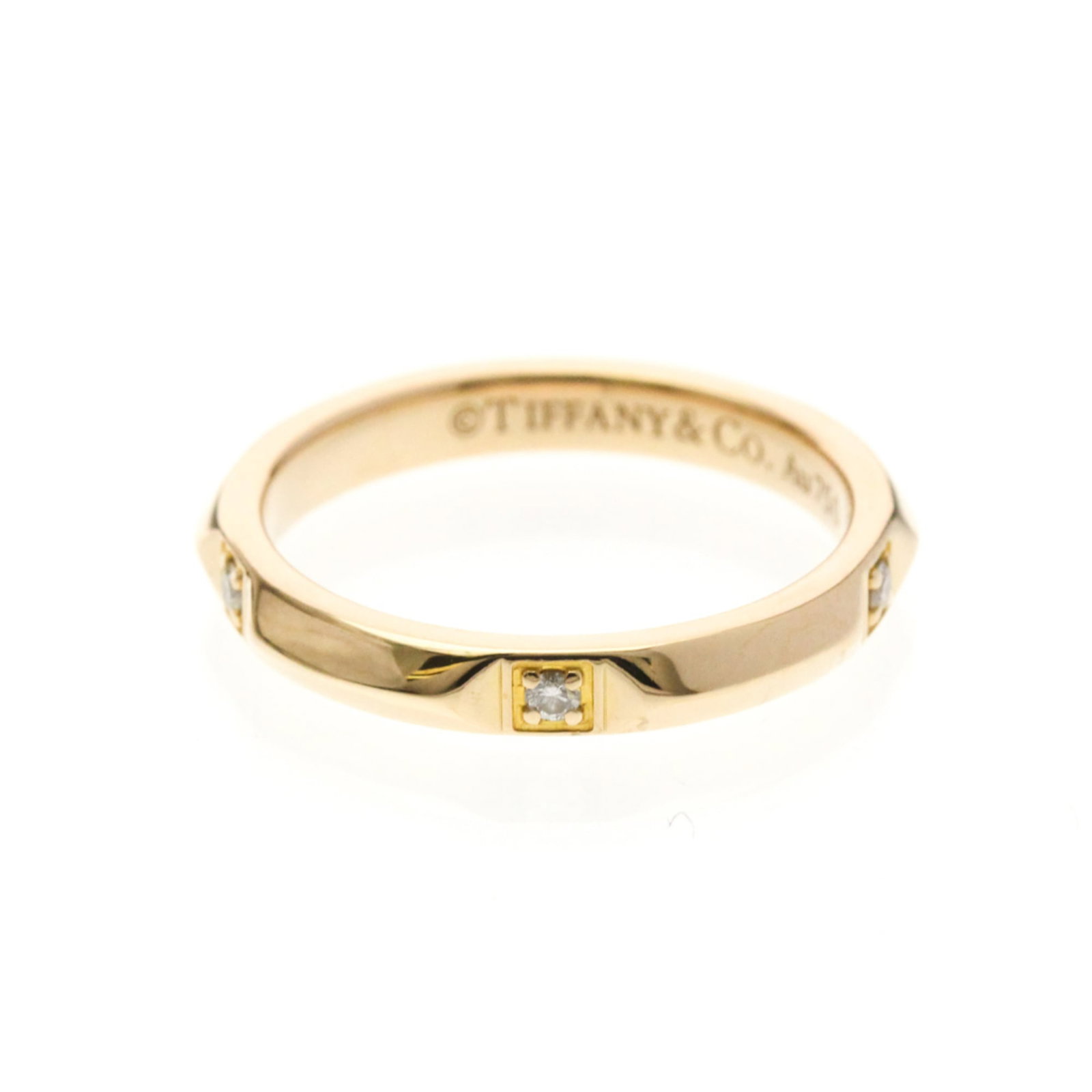 Pink Gold Ring Band Tiffany: Pink Gold Ring Band Tiffany Pink Gold Ring Band Tiffany - A Fashion Statement Piece. This 18K pink gold band features a diamond stone and has a sleek, modern design that adds a touch of elegance to an