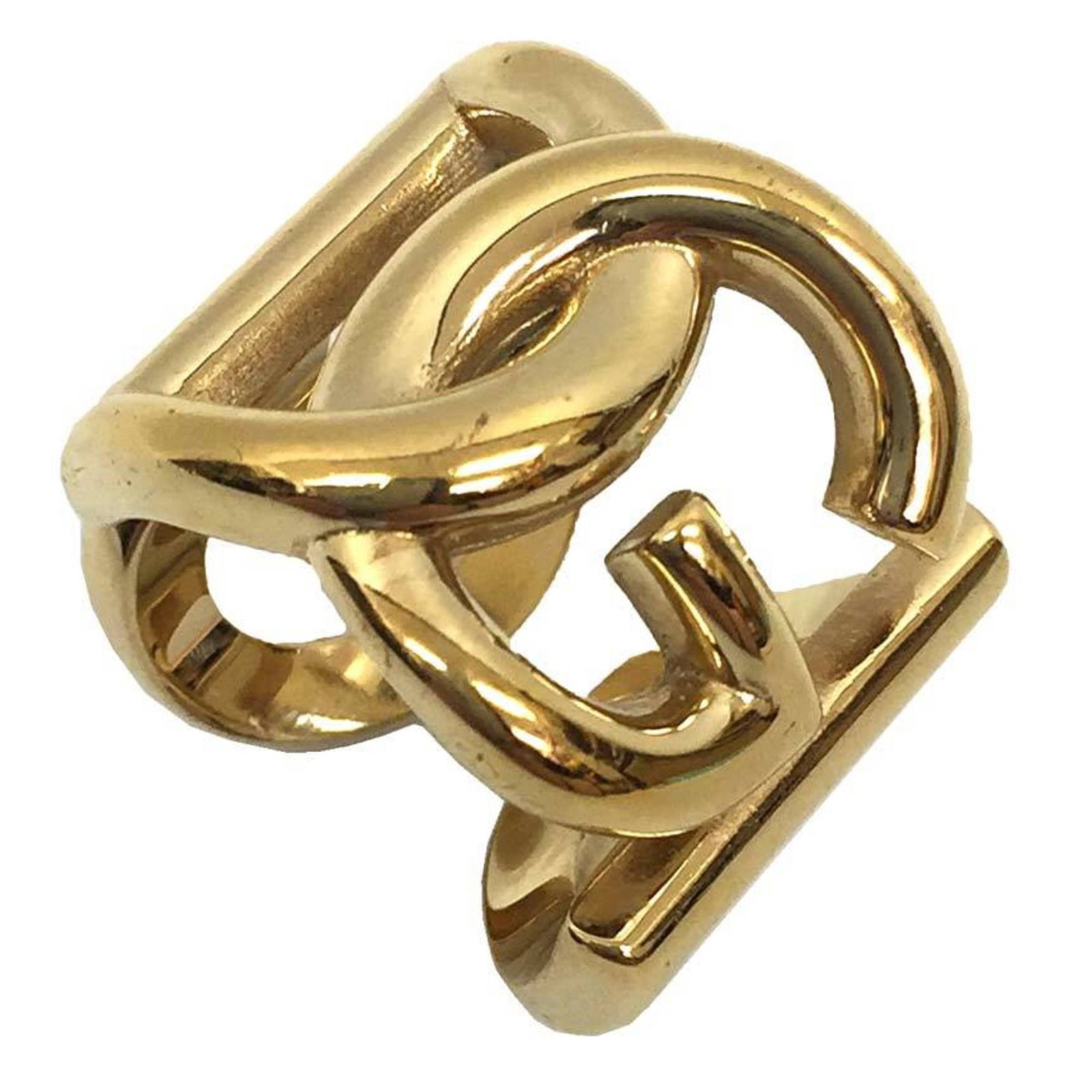 Metal band ring from Dolce Gabbana: Metal band ring from Dolce Gabbana Gold metal band ring from Dolce & Gabbana, featuring a classic design with a few traces of usage visible. The item shows some scratches and dirt but remains in very 