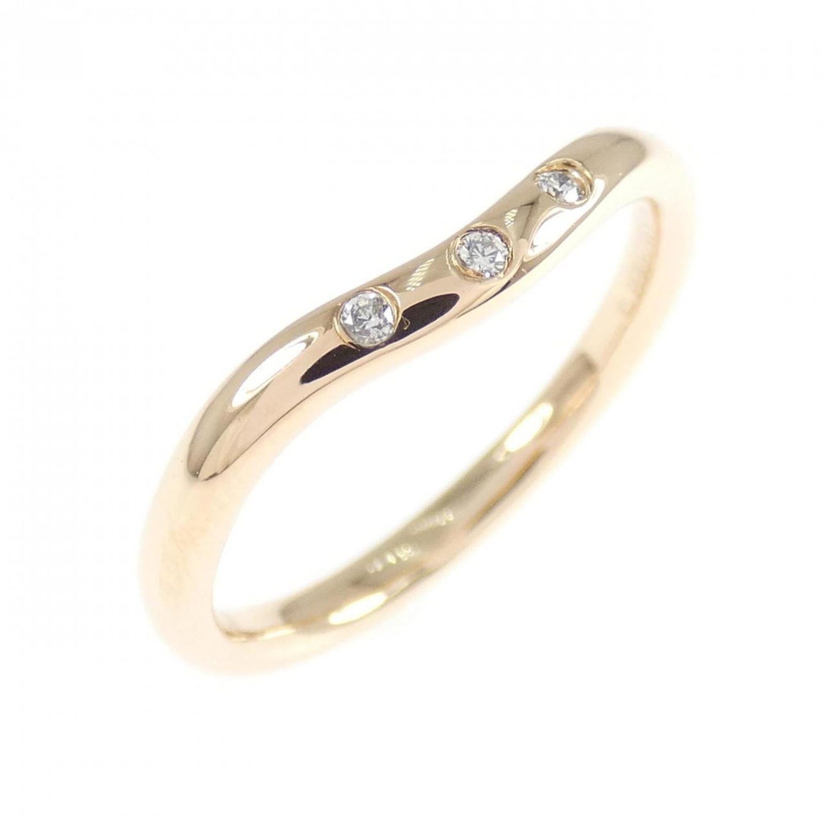 Pink Gold Ring Band Tiffany: Pink Gold Ring Band Tiffany Pink Gold Ring Band Tiffany features a beautiful diamond stone set in an 18K pink gold band, available in size 5. This used but like new ring has hardly any traces of usage