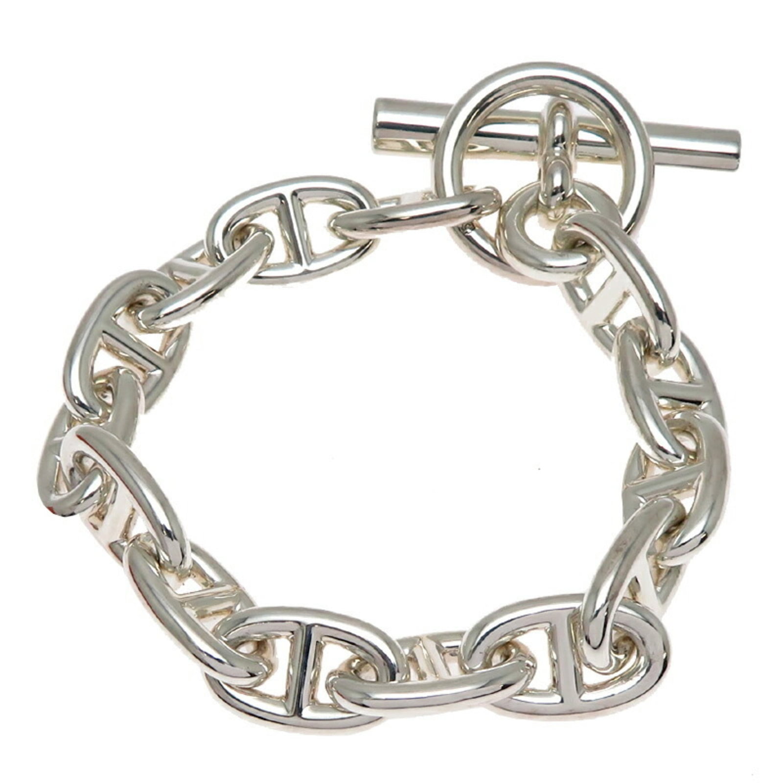Sterling silver charm bracelet by Hermes: Sterling silver charm bracelet by Hermes Sterling silver charm bracelet by Hermes, featuring intricate details and subtle wear from previous use. The 925 purity ensures durability and a touch of luxur