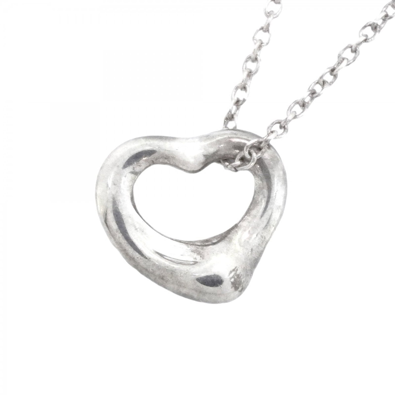 Women's Sterling Silver 925 Tiffany Co.: Women's Sterling Silver 925 Tiffany Co. Sterling silver necklace from Tiffany Co., featuring a 10mm x 11.1mm pendant, measures 40.5 cm in circumference, and bears the hallmark of 925 silver. The