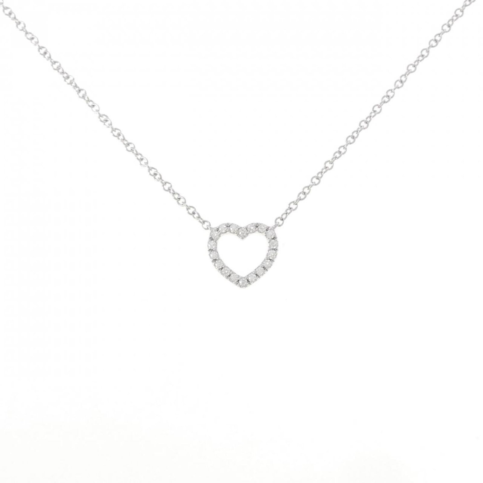 Tiffany Metro Heart Mini Necklace: Tiffany Metro Heart Mini Necklace Tiffany Metro Heart Mini Necklace features a beautiful white gold (18K) pendant with a classic design, bearing a signature. The necklace has a 41 cm / 16.14'' neck ci