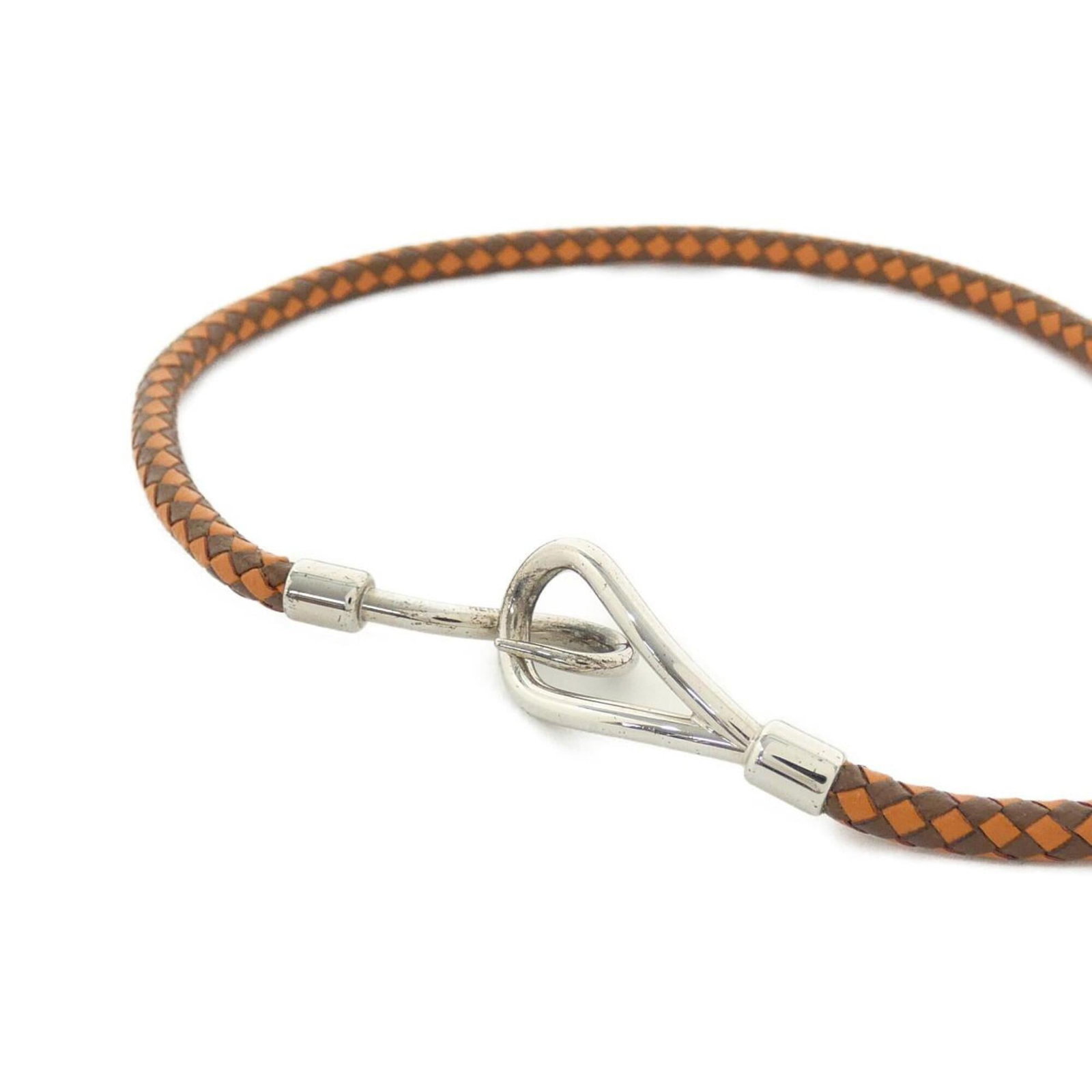 Jumbo Choker by Hermes: Jumbo Choker by Hermes Used Jumbo Choker by Hermes, featuring brown and orange tones. This choker boasts a classic design with a 38 cm circumference, suitable for various neck sizes. With some minor s