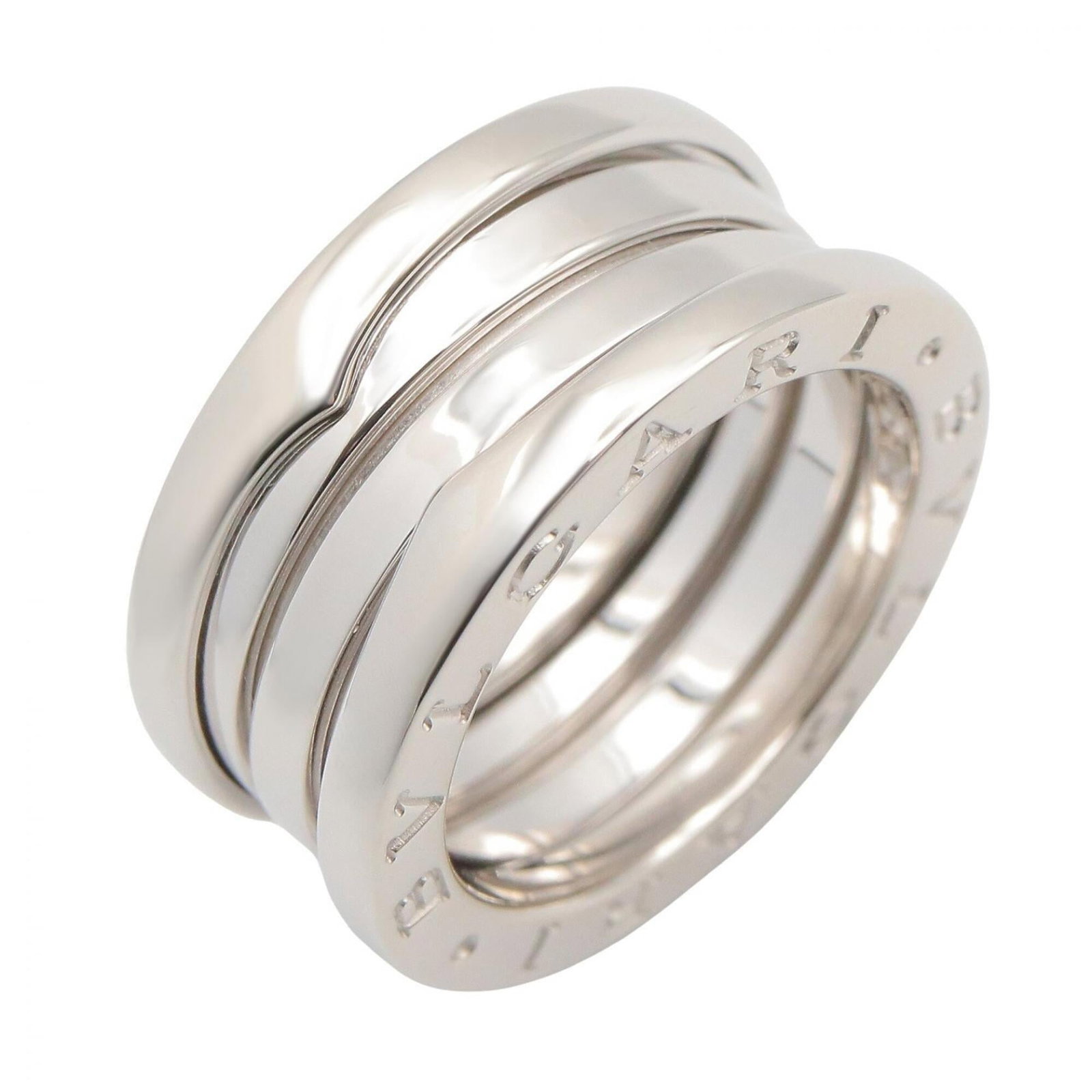Bvlgari Band Ring White Gold (18K): Bvlgari Band Ring White Gold (18K) Bvlgari Band Ring White Gold (18K) features a sleek, silver design crafted from high-quality white gold. The ring boasts a classic band style that suits both men and