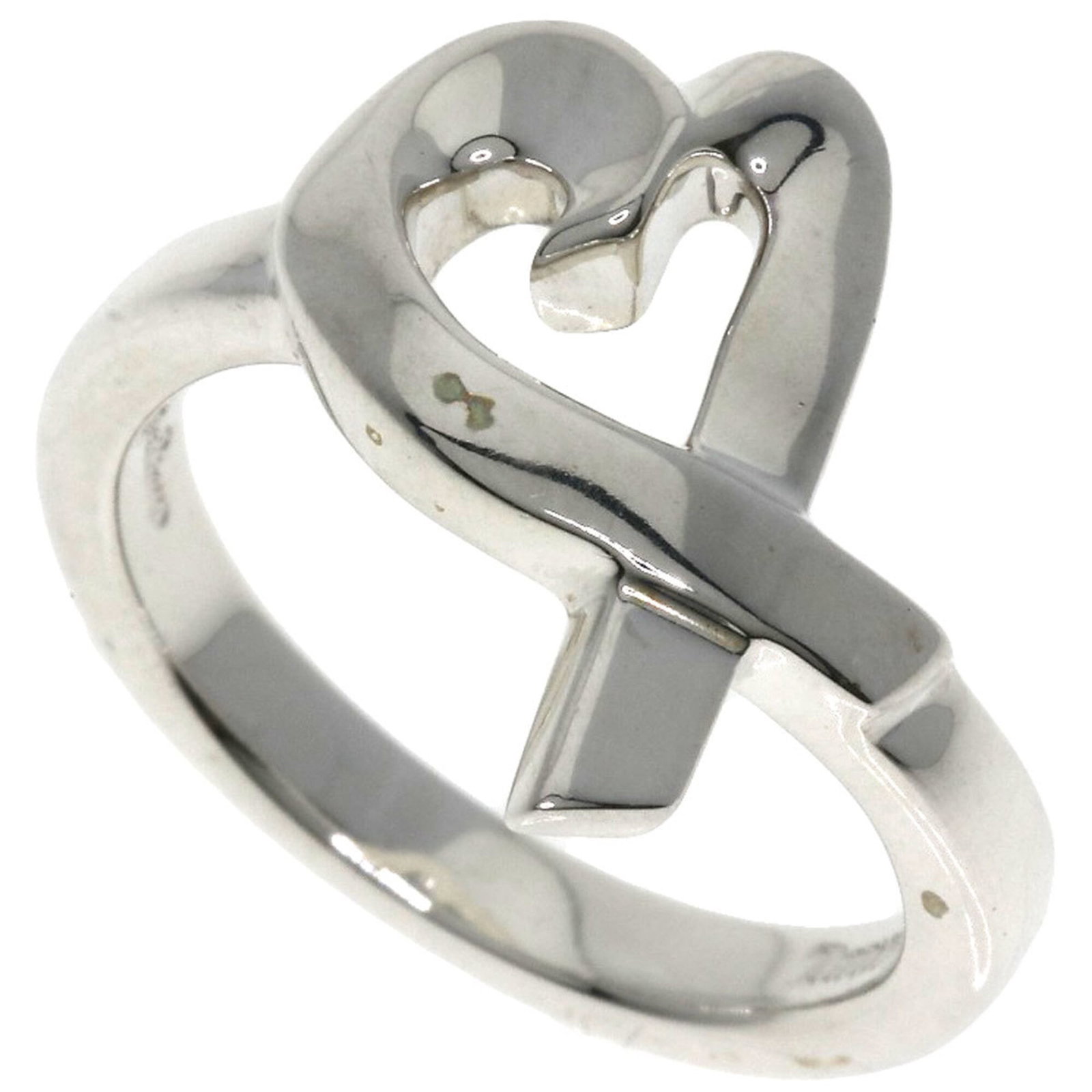 Silver Ring Tiffany Band: Silver Ring Tiffany Band Silver Ring Tiffany Band features a classic design made from sterling silver, with a timeless style perfect for everyday wear. This used band ring has some minor scratches and