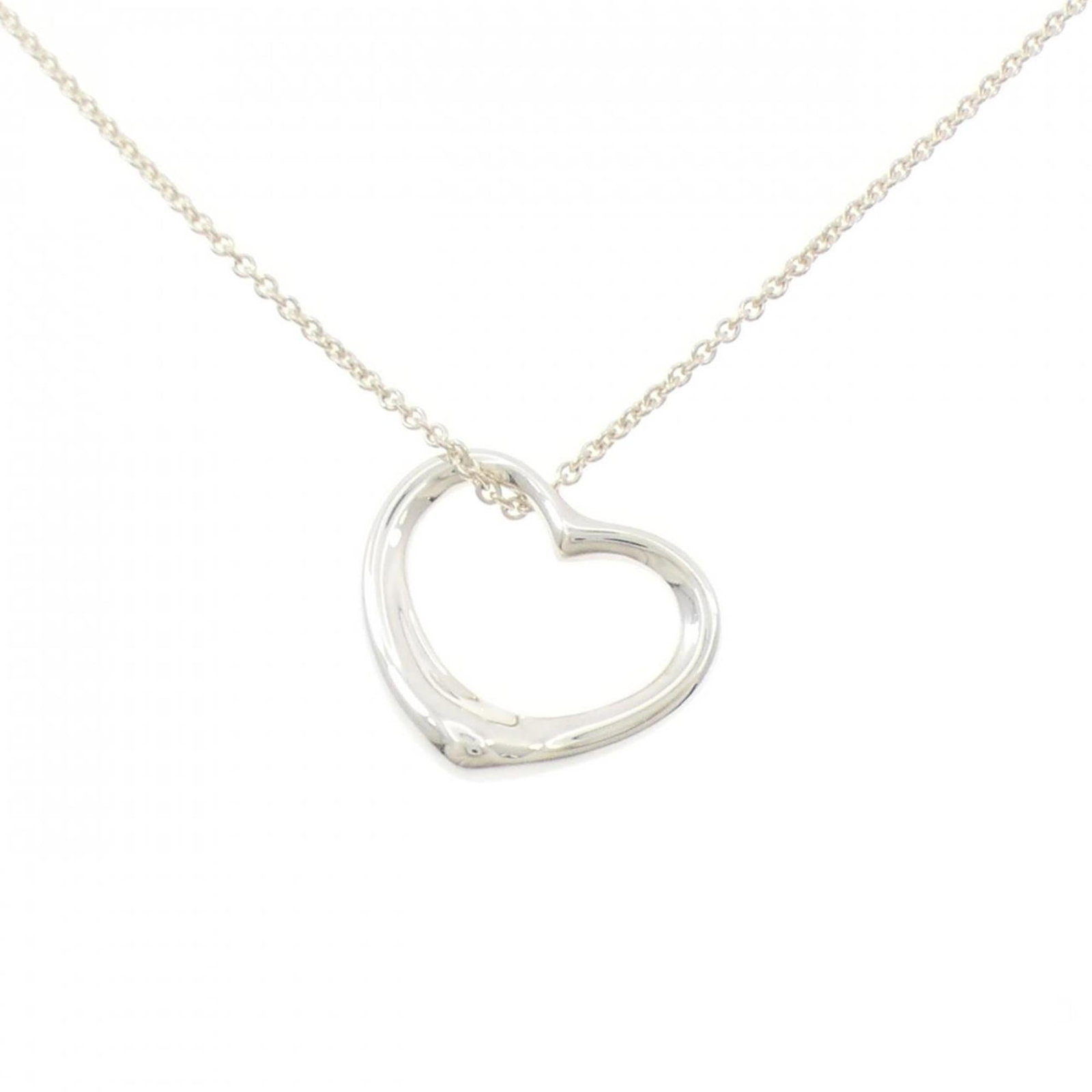 Heart Open Tiffany Necklace: Heart Open Tiffany Necklace The Heart Open Tiffany Necklace boasts a sleek silver design, featuring a pendant with a sizeable 21mm x 20.2mm shape. Made from high-quality 925 sterling silver, this