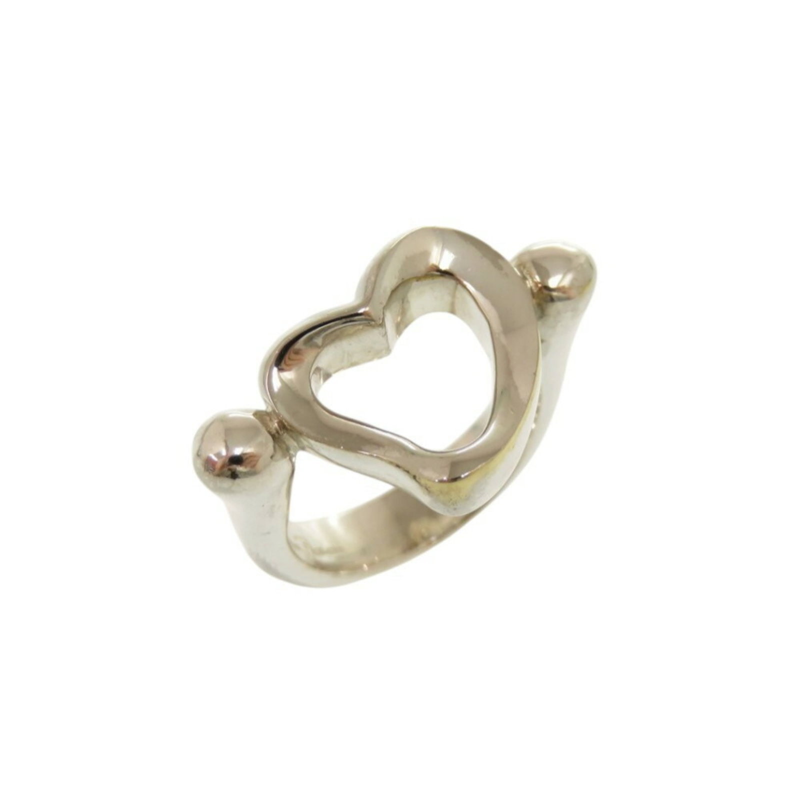Tiffany Band Ring Silver 925: Tiffany Band Ring Silver 925 Silver 925 band ring from Tiffany, featuring a classic design with subtle wear and minor scratches. This used item retains its original silver finish despite some signs of