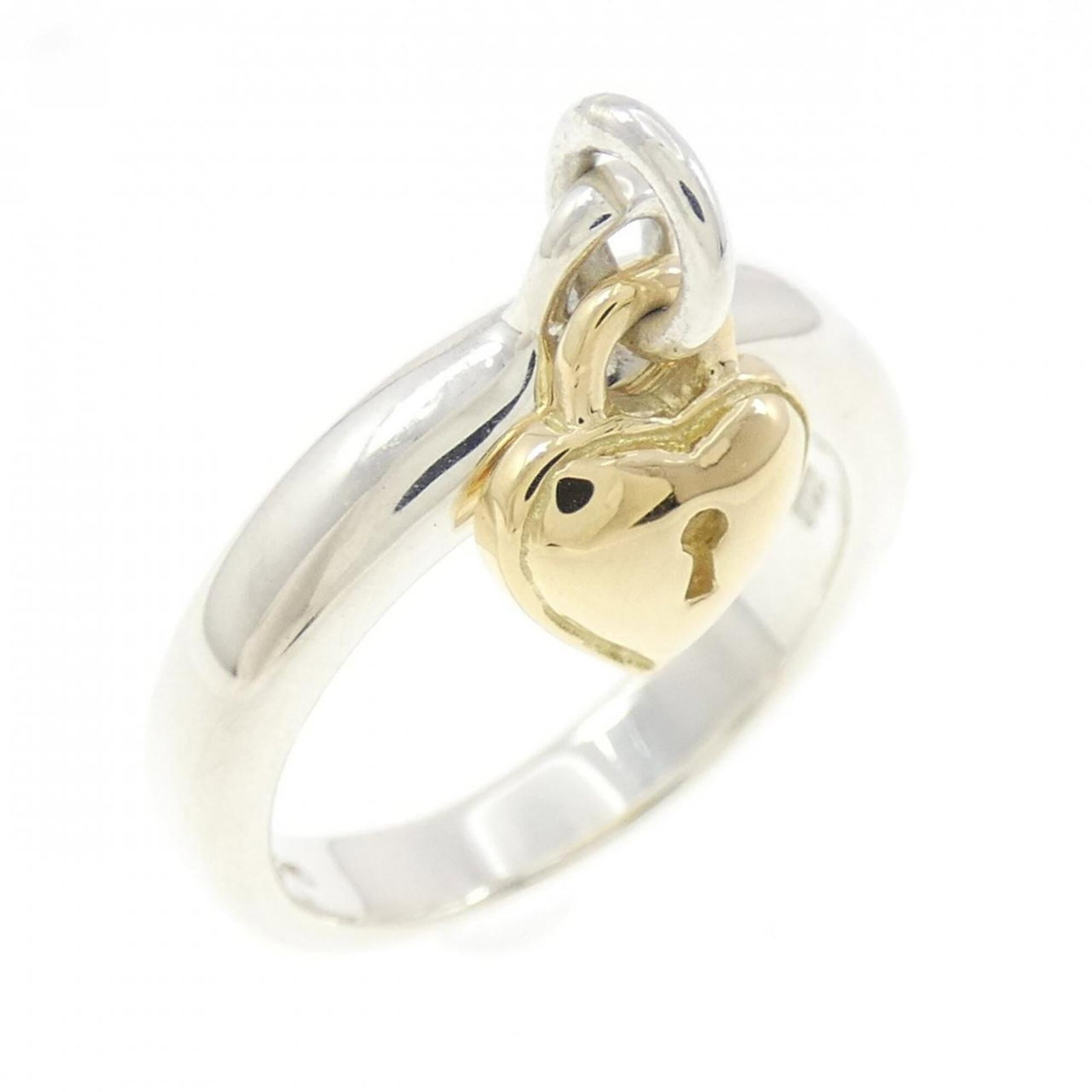 Tiffany Band Ring Silver 925 Yellow Gold (18K): Tiffany Band Ring Silver 925 Yellow Gold (18K) Silver 925 and 18K Yellow Gold combine in this elegant band ring from Tiffany, offering a touch of luxury to any outfit. The used condition reveals only 