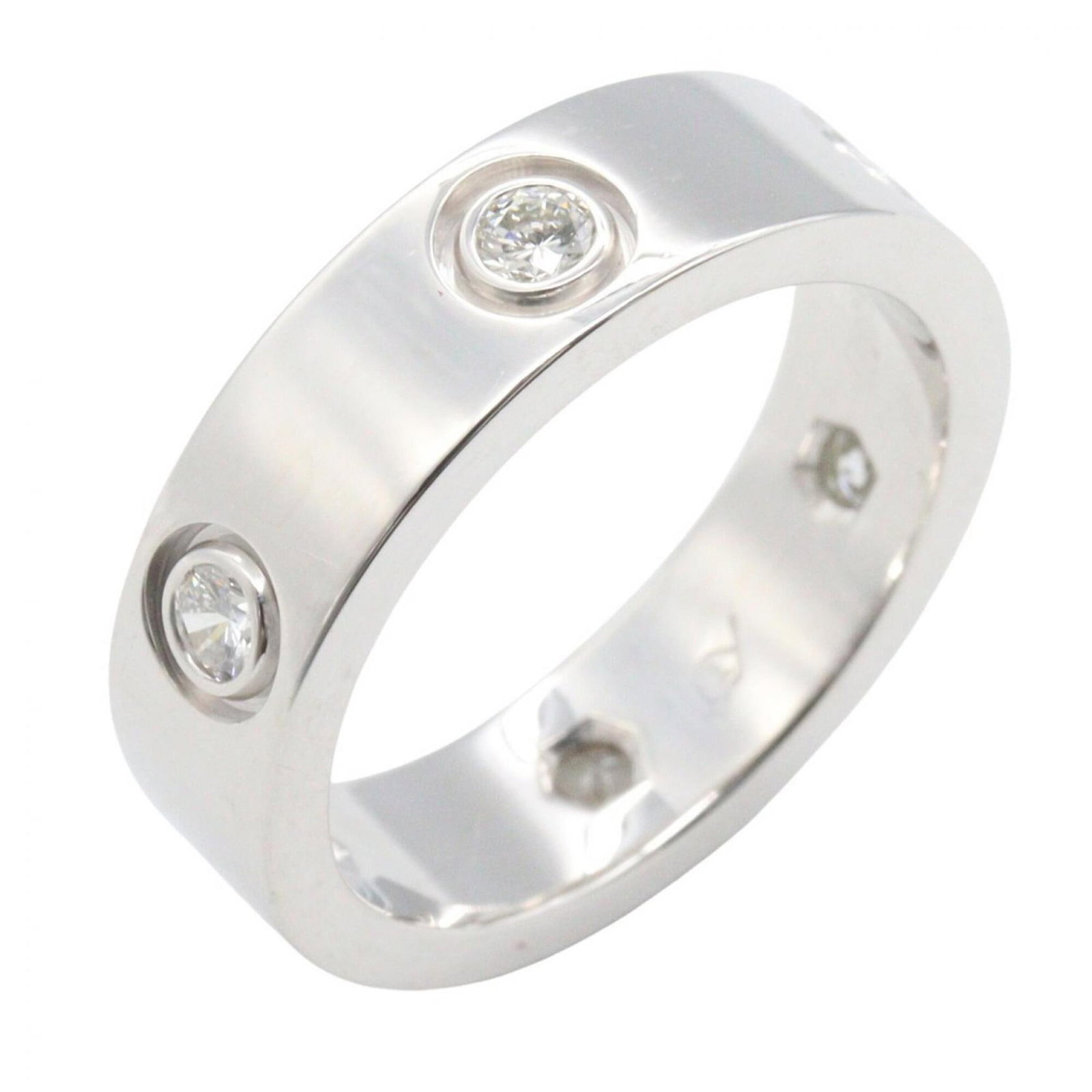 White Gold Cartier Band Ring 18K: White Gold Cartier Band Ring 18K White Gold Cartier Band Ring 18K features an 18K white gold band with a diamond stone, available in US size 6.5 and matching the brand's standard size. This used item 