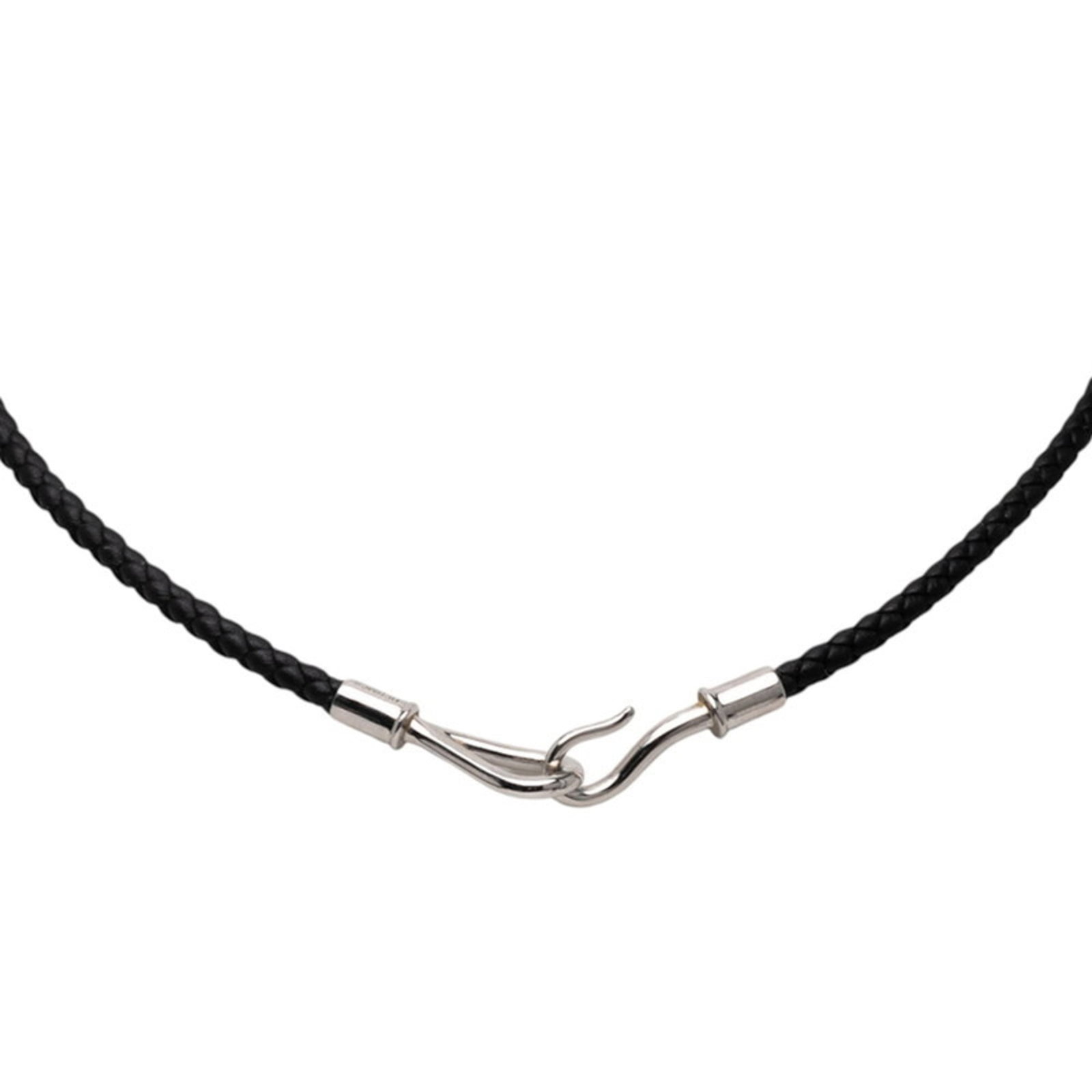 Metal Leather Charm Hermes Bracelet: Metal Leather Charm Hermes Bracelet The metal leather charm Hermes bracelet boasts a sleek black design, measuring 17cm in length. With its durable leather and metal construction, it has withstood