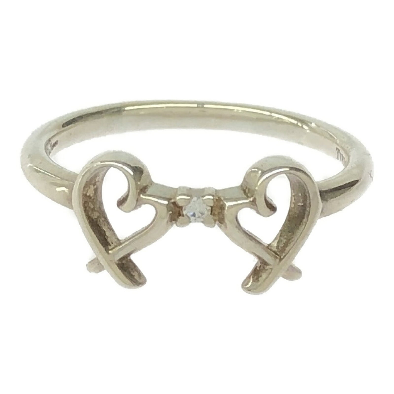 Tiffany Band Ring Silver 925: Tiffany Band Ring Silver 925 Silver band ring from Tiffany, made from high-quality silver 925 metal. The ring features a classic design with a simple yet elegant look, suitable for everyday wear.