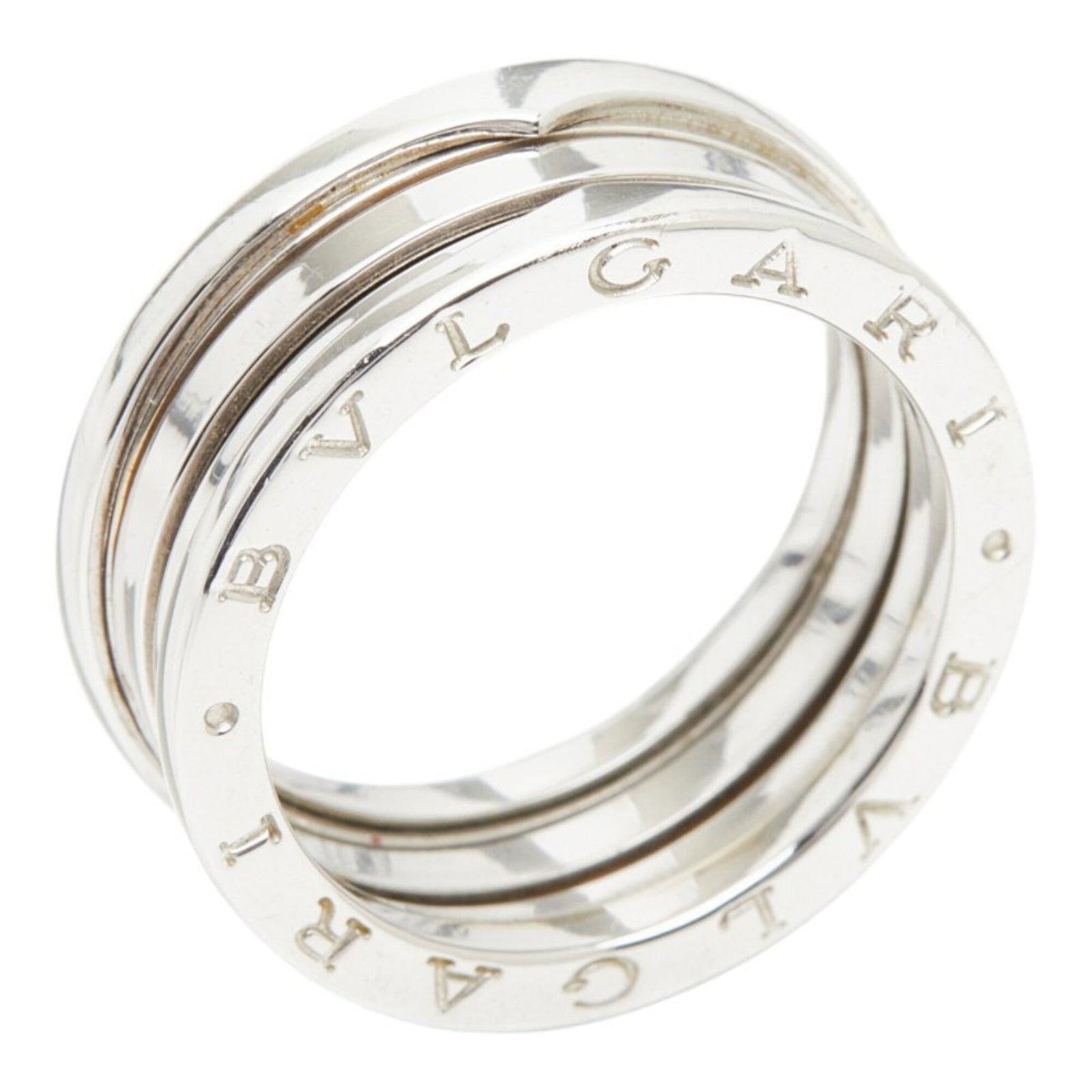 Bvlgari Band Ring White Gold (18K): Bvlgari Band Ring White Gold (18K) Bvlgari Band Ring White Gold (18K) in excellent used condition, featuring the iconic Bvlgari design with a few traces of usage visible. The ring's white gold materia
