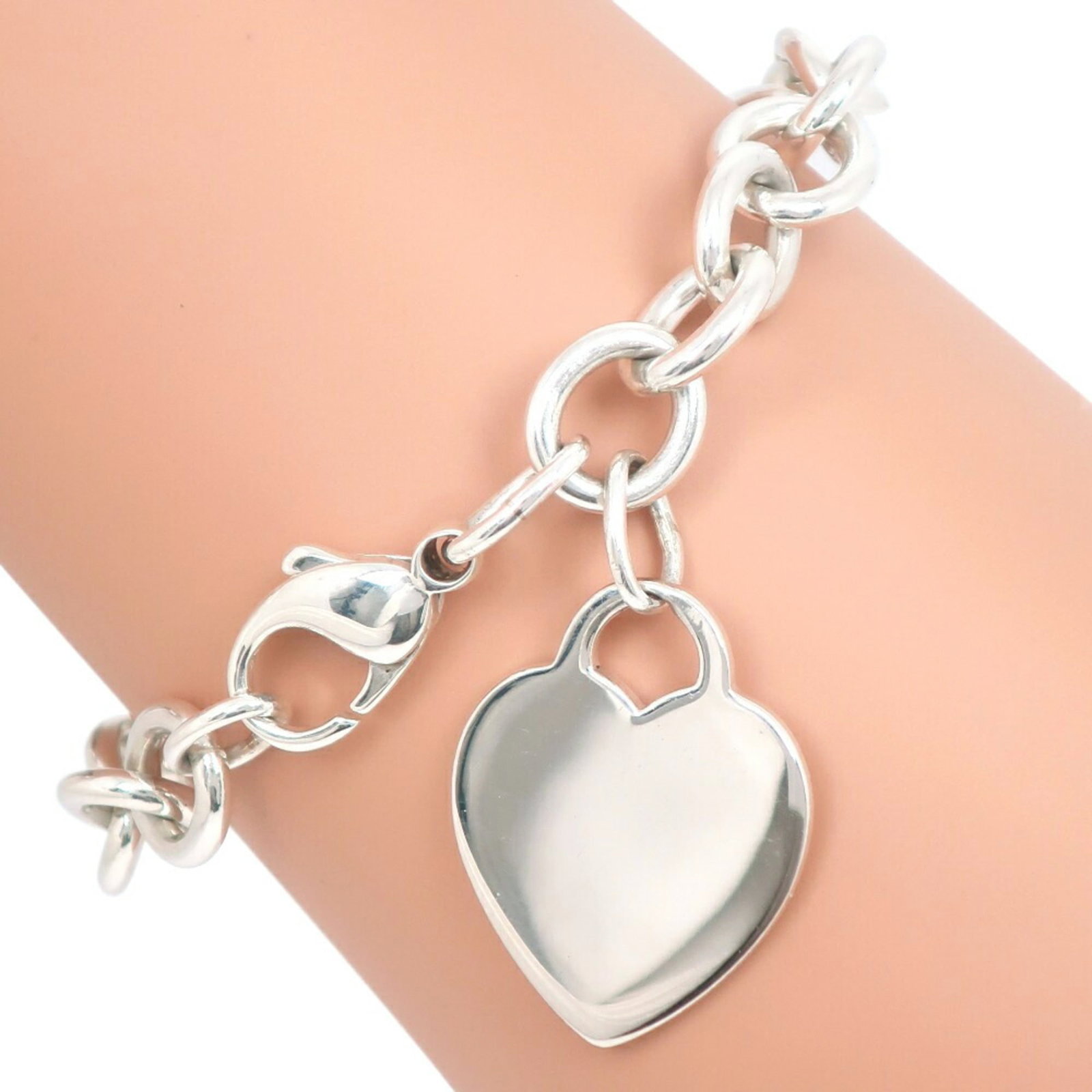 Charm Tiffany Bracelet 925 Silver: Charm Tiffany Bracelet 925 Silver Charm Tiffany Bracelet 925 Silver - A delicate, sterling silver charm bracelet with a subtle elegance. Measuring 18.5cm in length and weighing 29.8g, this 925 silver 