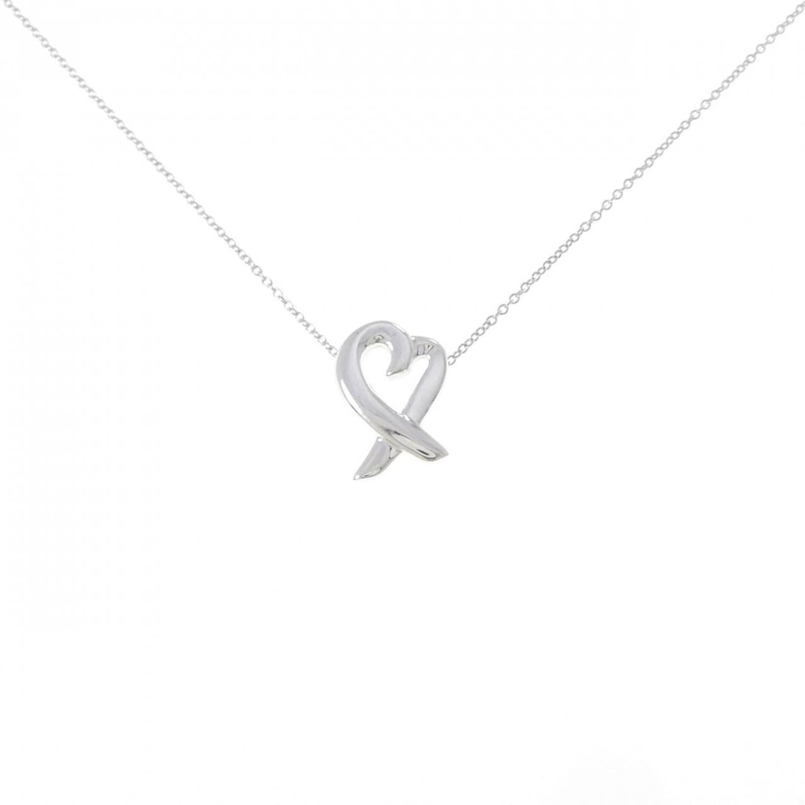 Small Loving Heart Necklace by Tiffany: Small Loving Heart Necklace by Tiffany Small Loving Heart Necklace by Tiffany, crafted from sterling silver 925, features a delicate pendant with a 16mm x 11.1mm size. This elegant necklace boasts a