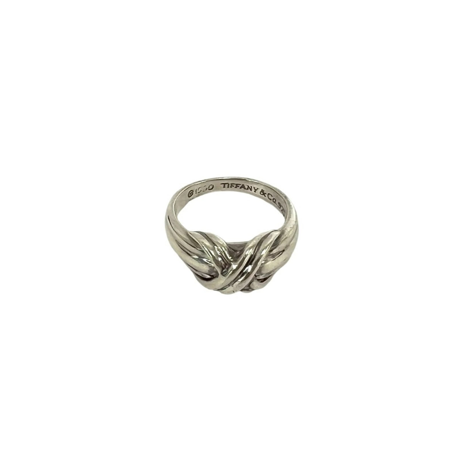 Tiffany Band Ring Silver 925: Tiffany Band Ring Silver 925 Silver 925 band ring from Tiffany, featuring a classic design with subtle wear and minor scratches. This used item retains its original silver finish despite some signs