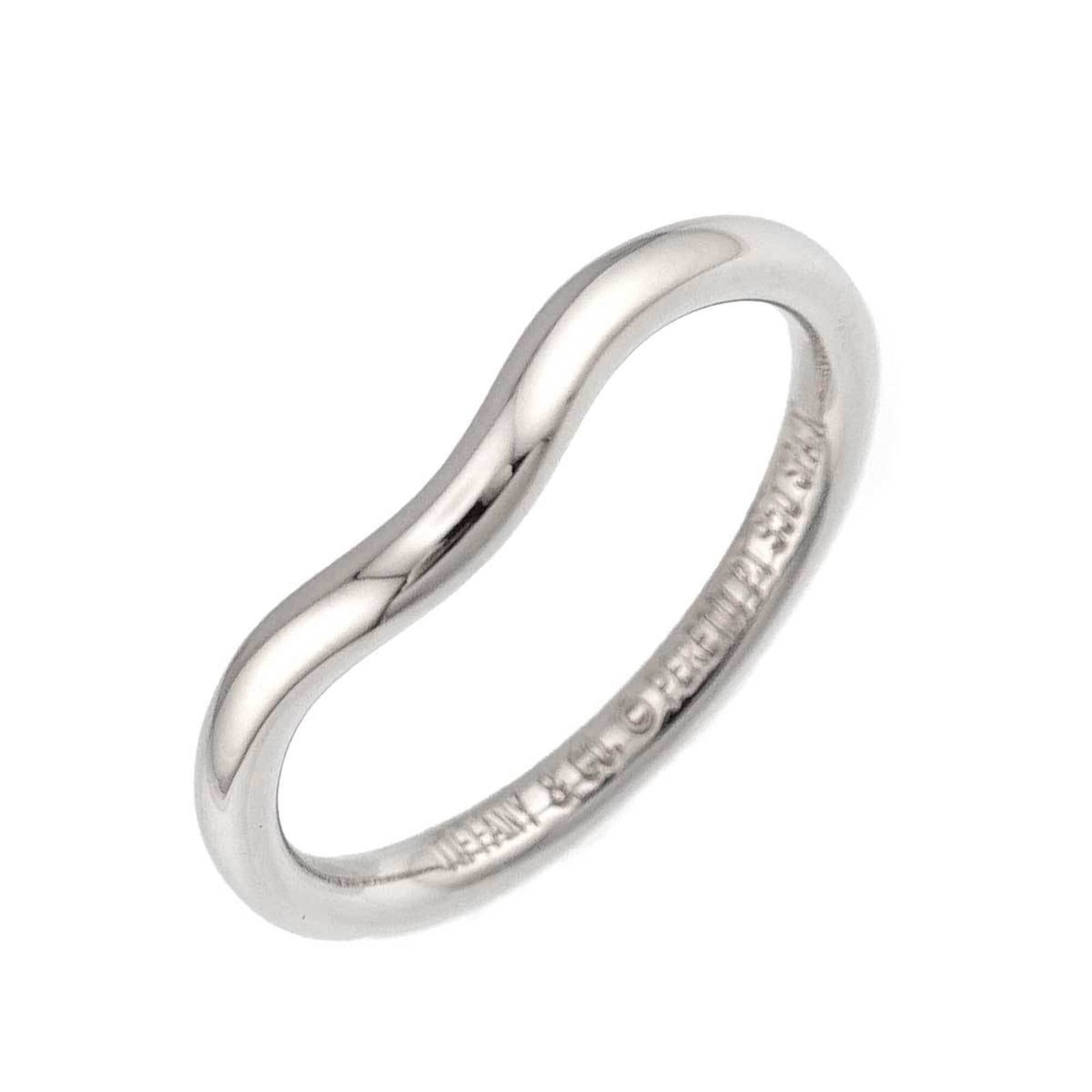 Platinum ring by Tiffany band: Platinum ring by Tiffany band Platinum ring by Tiffany & Co. features a stunning band design, crafted from high-quality platinum. This 950-plated piece boasts a sleek and sophisticated look, suitable