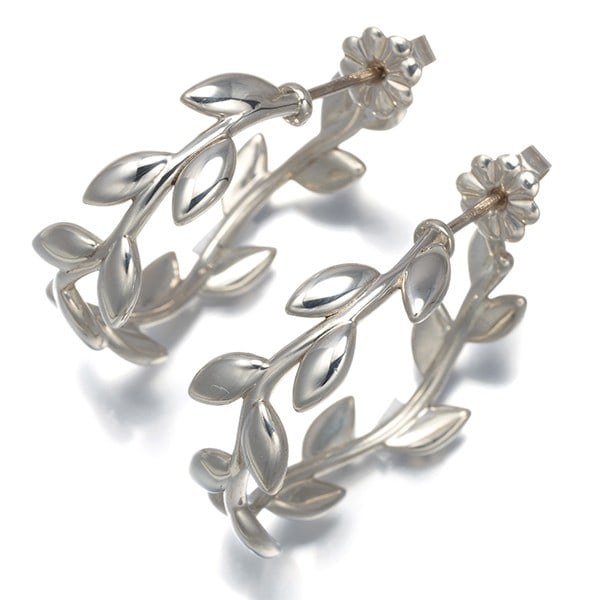 Tiffany Co Silver Hoop Earrings Olive Leaf 925: Tiffany Co Silver Hoop Earrings Olive Leaf 925 Sterling Silver Hoop Earrings with Olive Leaf Design by Paloma Picasso, featuring the iconic Tiffany & Co. brand and 925 metal purity. These elegant