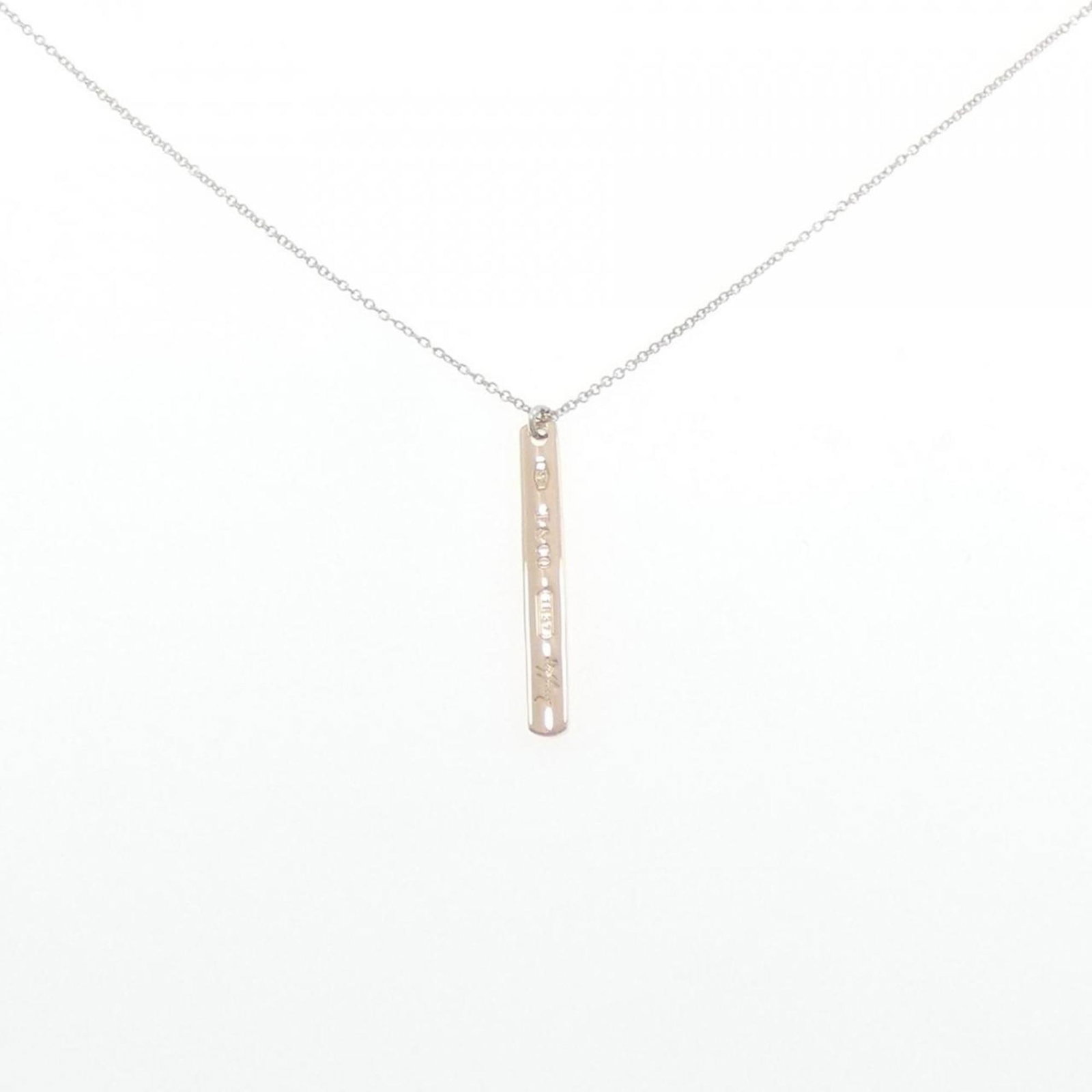 Small Bar Necklace from Tiffany 1837: Small Bar Necklace from Tiffany 1837 Small Bar Necklace from Tiffany 1837, featuring a 30.9mm x 4mm pendant with a 41cm / 16.14" adjustable neck circumference, bearing a signature. This used necklace