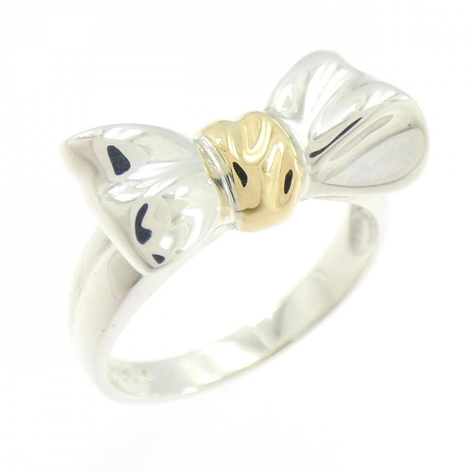 Tiffany & Co. 925 750Yg Ring: Tiffany & Co. 925 750Yg Ring Silver Tiffany & Co. ring with 18K yellow gold accents, featuring a classic design in a 925 sterling silver setting. The ring bears some minor scratches and signs of wear,