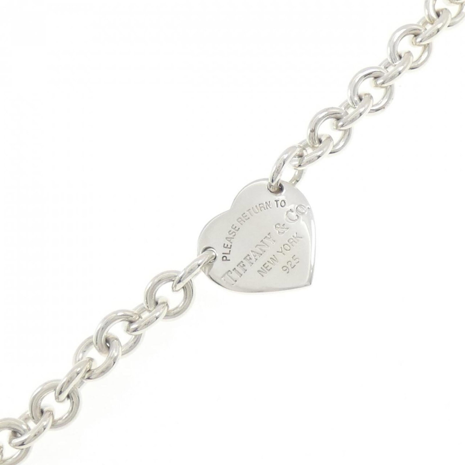 Charm Tiffany Bracelet 925 Silver: Charm Tiffany Bracelet 925 Silver Charm Tiffany Bracelet 925 Silver - A pre-owned, high-quality silver charm bracelet featuring the iconic Tiffany brand, with a length of 18.5cm and made from durable 