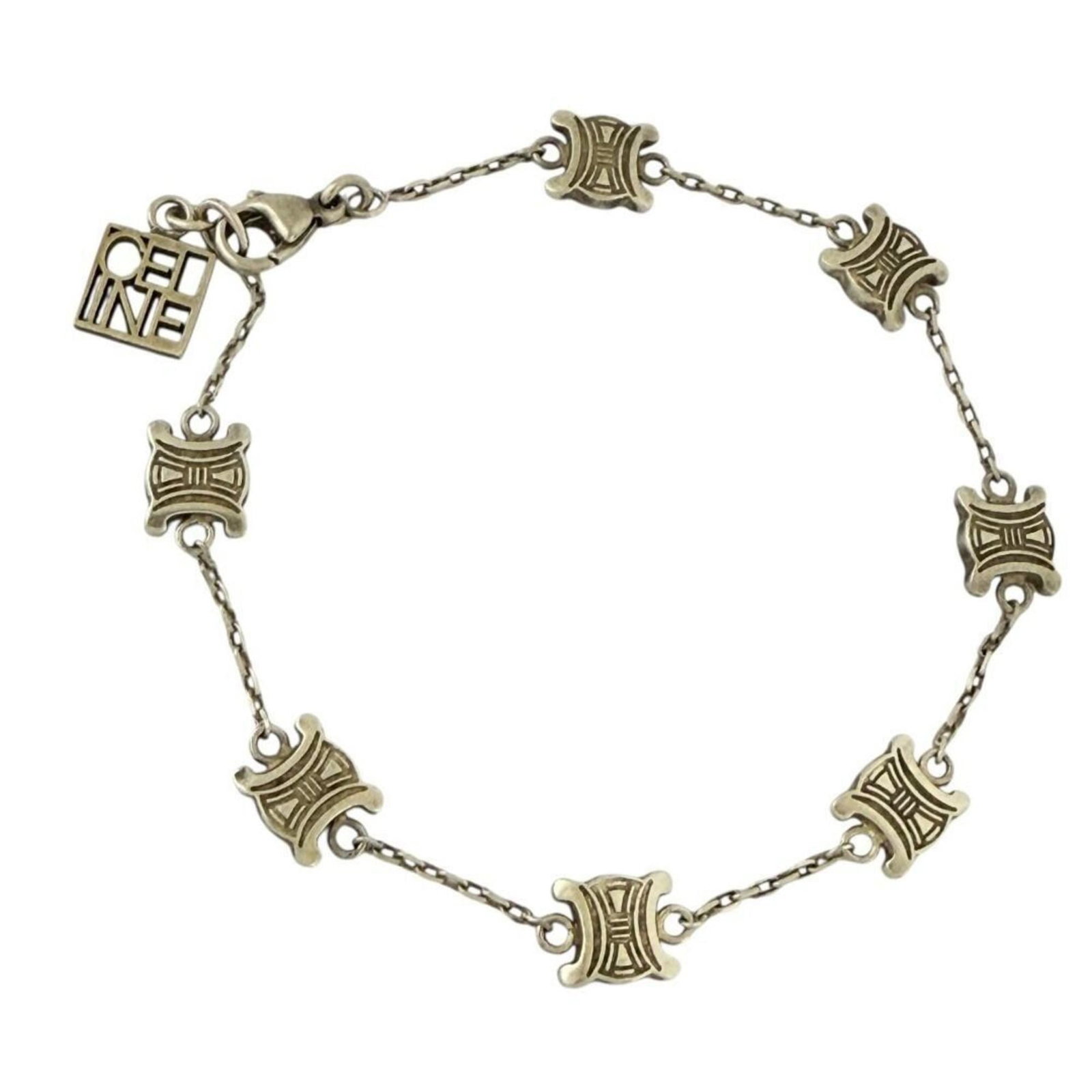 Metal Charm Celine Bracelet: Metal Charm Celine Bracelet Gold metal charm Celine bracelet, measuring 20cm in length. The bracelet features a few traces of usage and some minor scratches/dirt, but remains in very good condition