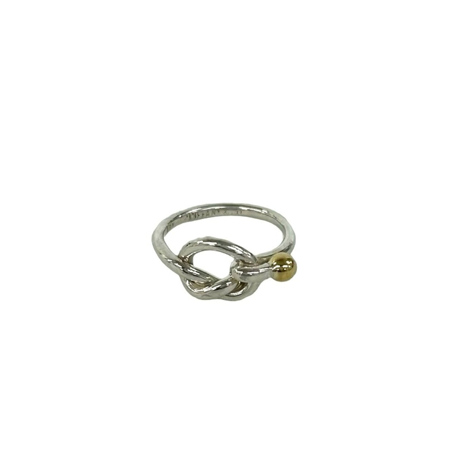 Tiffany Band Ring Silver 925 Yellow Gold (18K): Tiffany Band Ring Silver 925 Yellow Gold (18K) Silver 925 band ring with a touch of luxury, featuring 18K yellow gold accents. This pre-owned Tiffany piece boasts a classic design that still shines br