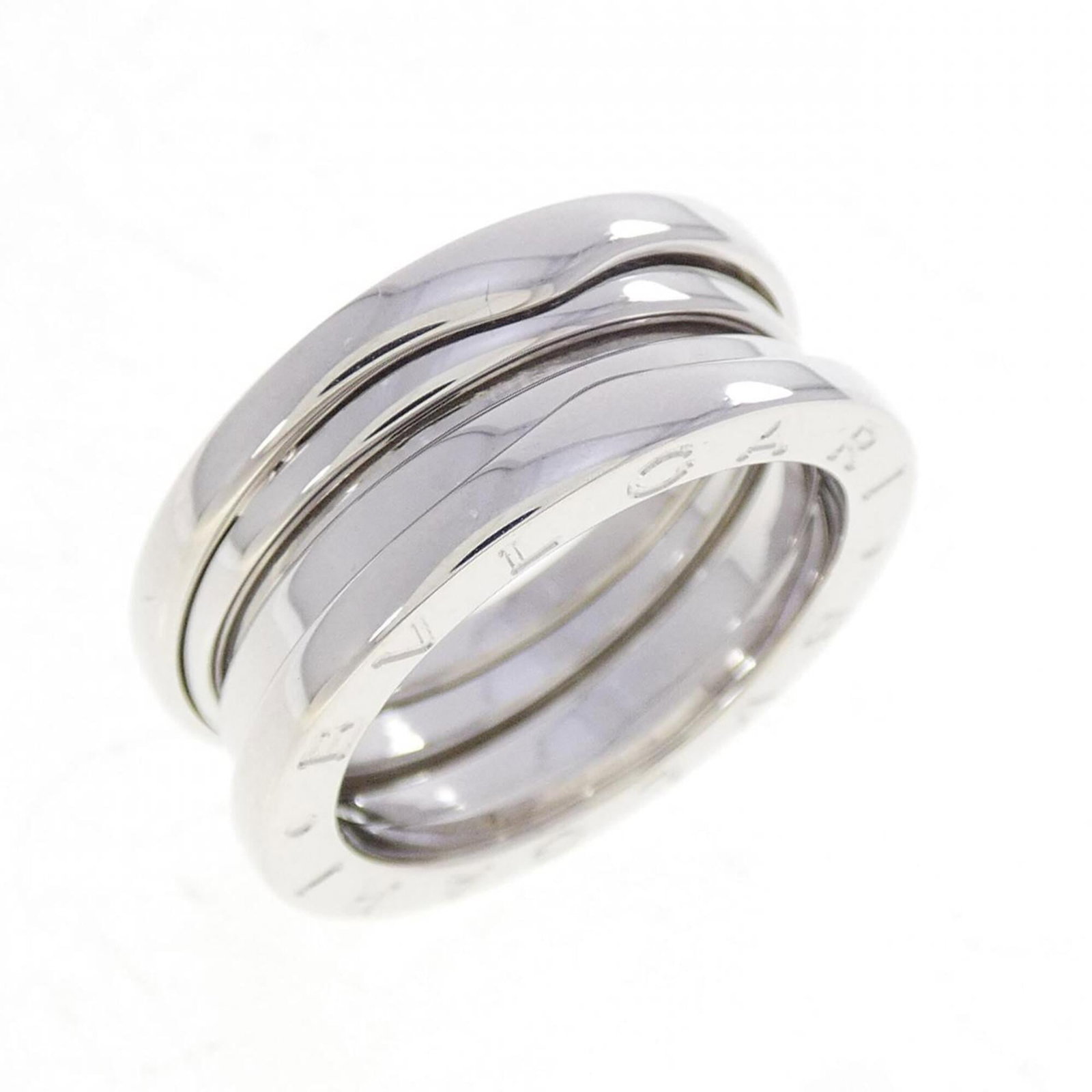 Bvlgari Band Ring White Gold (18K): Bvlgari Band Ring White Gold (18K) Bvlgari Band Ring White Gold (18K) - A sleek and sophisticated band ring featuring white gold (18K) craftsmanship. This used ring has traces of usage, with some dama