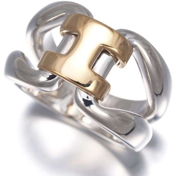 Hermes Ring History Eu51 925 Sterling Silver/ 18K 750 Yellow Gold: Hermes Ring History Eu51 925 Sterling Silver/ 18K 750 Yellow Gold Sterling silver and 18K yellow gold come together in the Hermes Ring History Eu51, a beautifully crafted piece featuring these two met