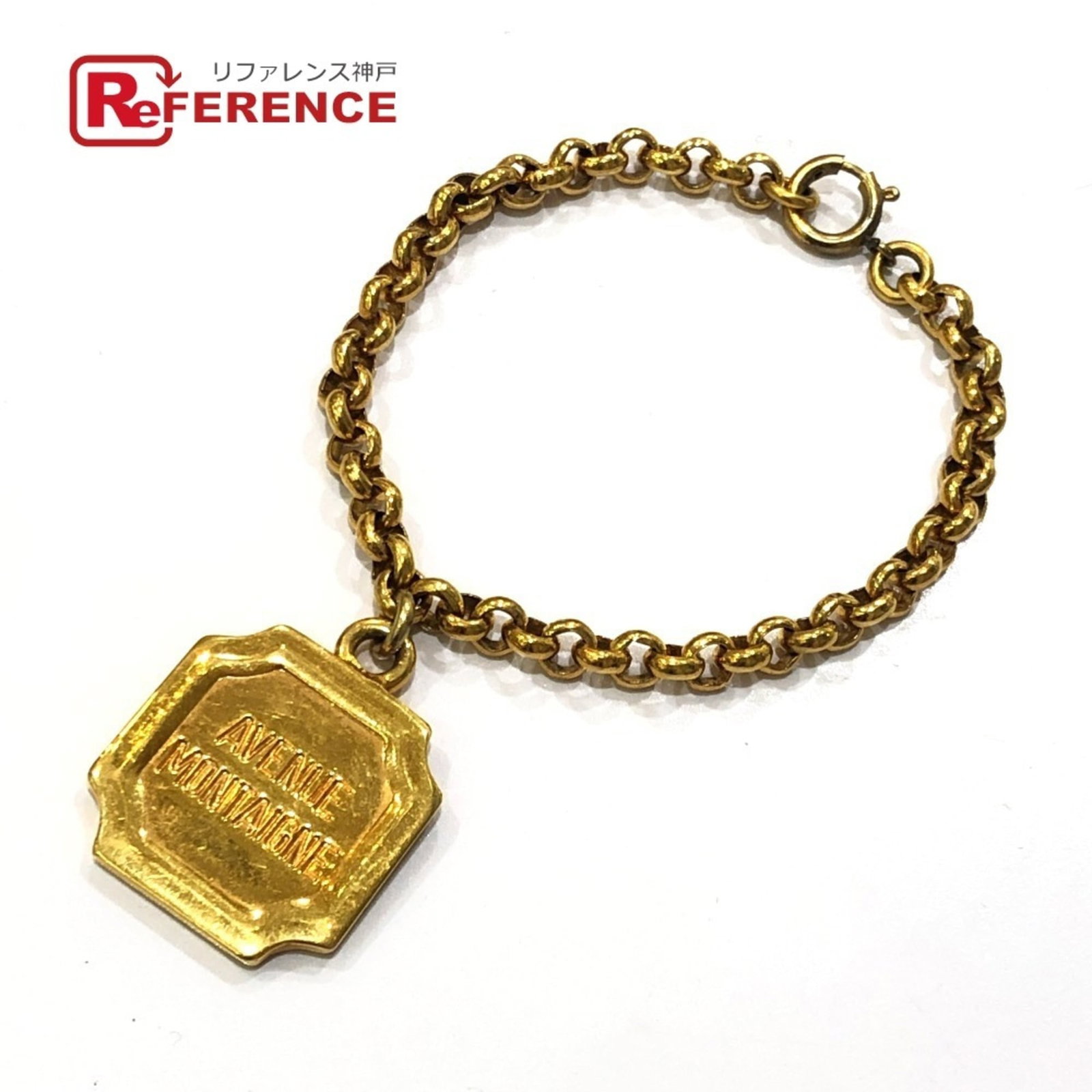 Metal Charm Celine Bracelet: Metal Charm Celine Bracelet Gold metal charm Celine bracelet with a length of 17cm, bearing traces of usage and minor scratches. The bracelet's gold color remains vibrant despite its used condition.