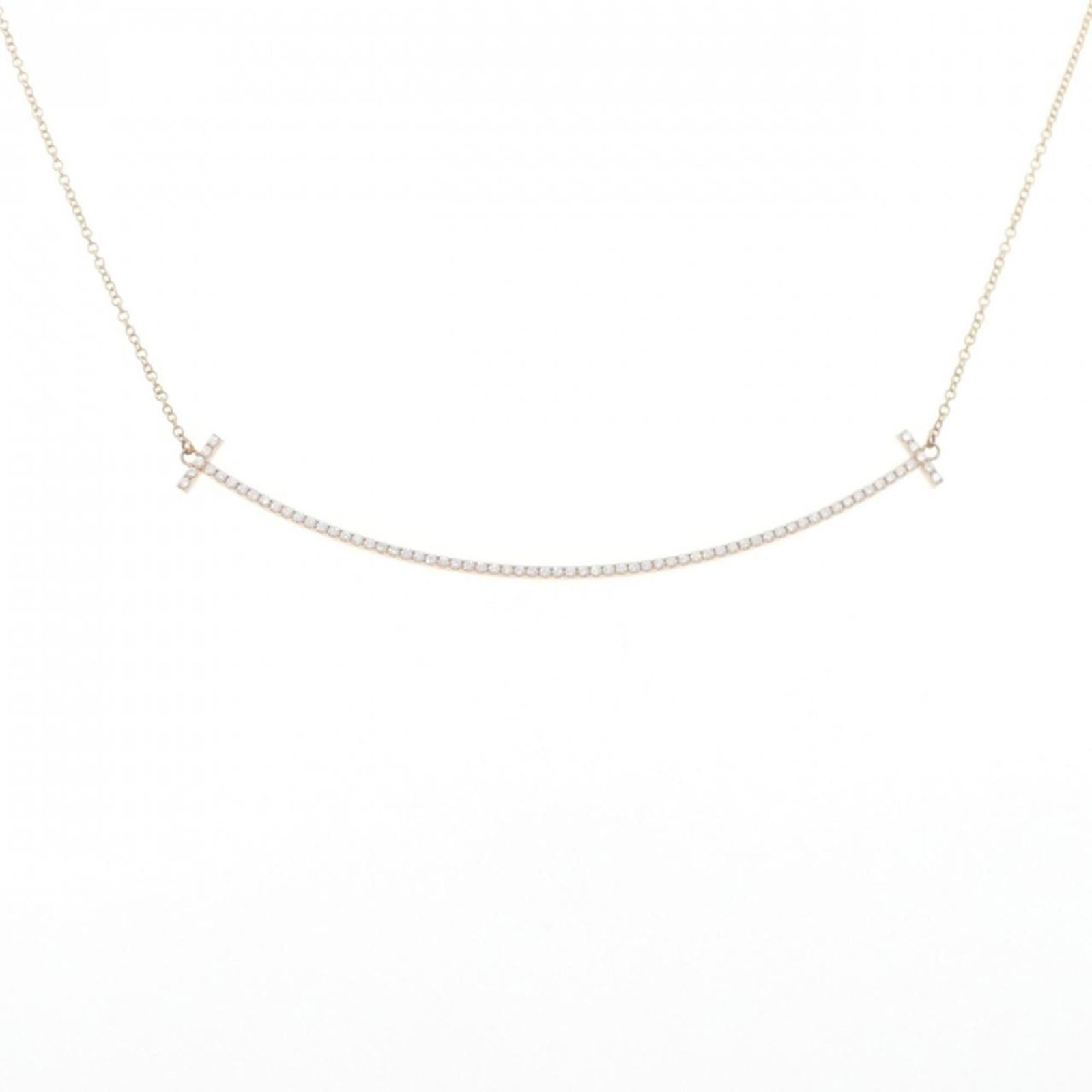 Tiffany T Smile Large Necklace: Tiffany T Smile Large Necklace Tiffany & Co. Large Tiffany T Smile Necklace in Pink Gold Alloy, featuring a 6mm x 68.7mm pendant with a 40 cm - 45 cm adjustable neck circumference. This necklace is