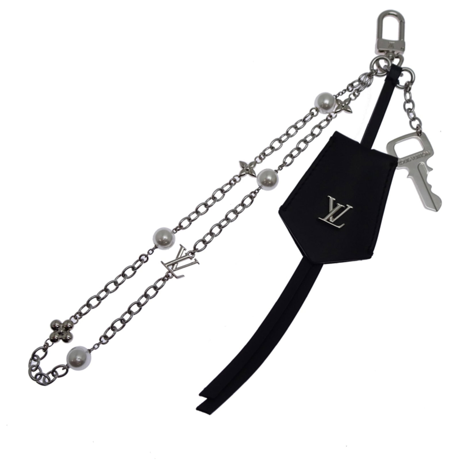 Metal Leather Charm Handbag Vuitton Louis: Metal Leather Charm Handbag Vuitton Louis Metal Leather Charm Handbag Vuitton Louis. This black and silver leather handbag charm features metal accents, measuring 230mm x 40mm in size. Opened but