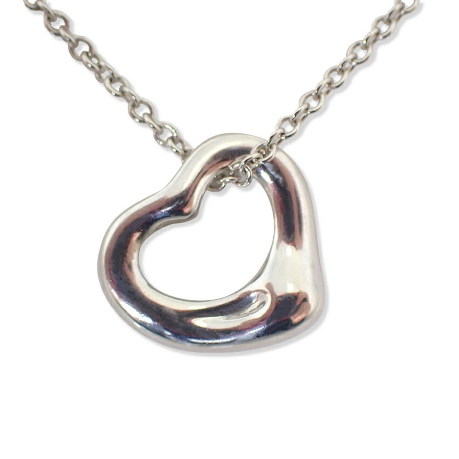 Tiffany & Co. 925 Heart Pendant Necklace: Tiffany & Co. 925 Heart Pendant Necklace Sterling silver pendant necklace from Tiffany & Co., featuring a 10mm x 11mm heart-shaped design. Made from high-quality 925 sterling silver, this necklace boa