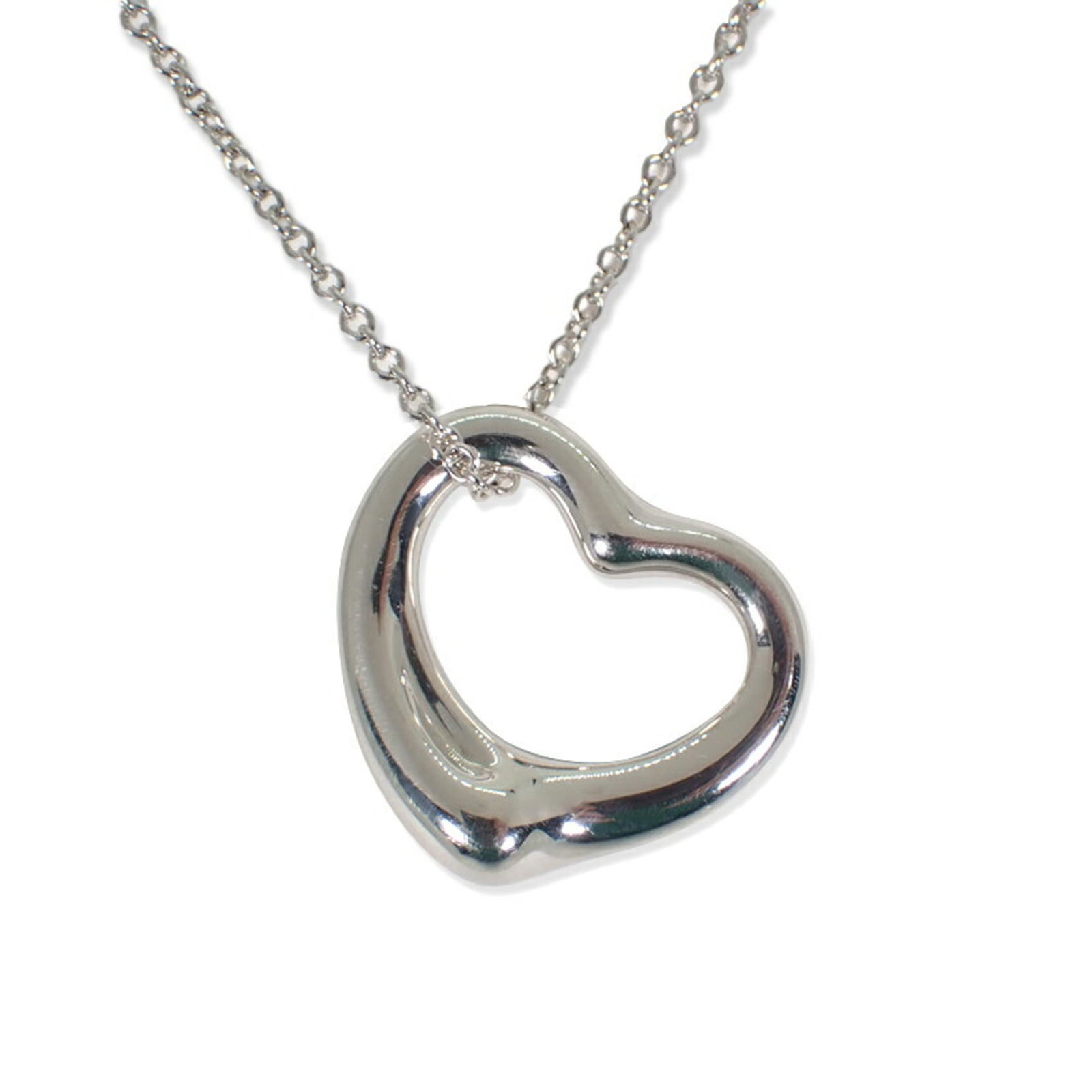 Co Tiffany Ag925 Heart Pendant: Co Tiffany Ag925 Heart Pendant Sterling Silver 925 Heart Pendant from Tiffany, featuring a classic design with a subtle shine. The necklace type pendant measures 19.6mm x 22.5mm and has a 40.5 cm / 15