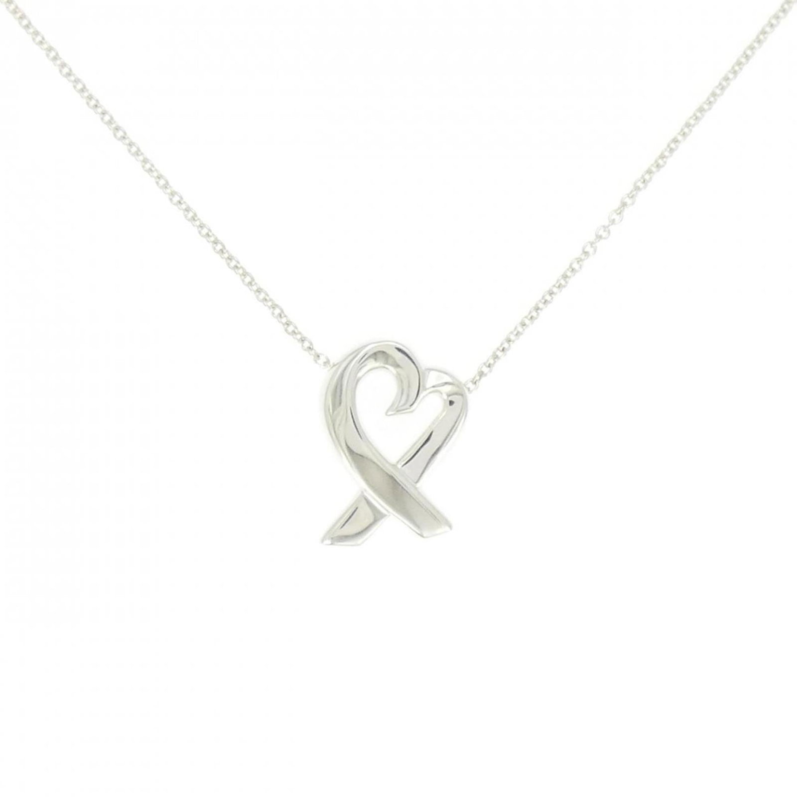 Small Loving Heart Necklace by Tiffany: Small Loving Heart Necklace by Tiffany Small Loving Heart Necklace by Tiffany features a sterling silver pendant with intricate details, measuring 15.4mm x 11.1mm. This delicate necklace boasts a