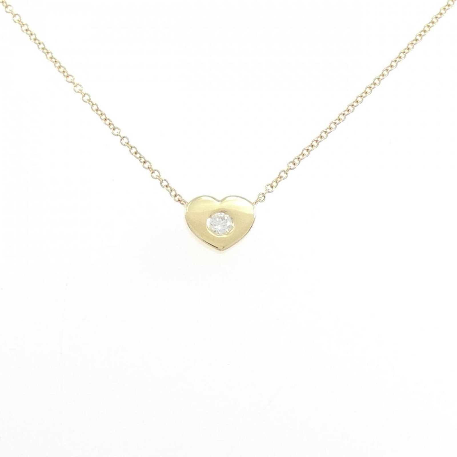 Heart Diamond Necklace by Tiffany: Heart Diamond Necklace by Tiffany Yellow gold (18K) Heart Diamond Necklace by Tiffany, featuring a pendant with dimensions of 6.7mm x 8.2mm, set against a chain with a neck circumference of 40 cm / 15