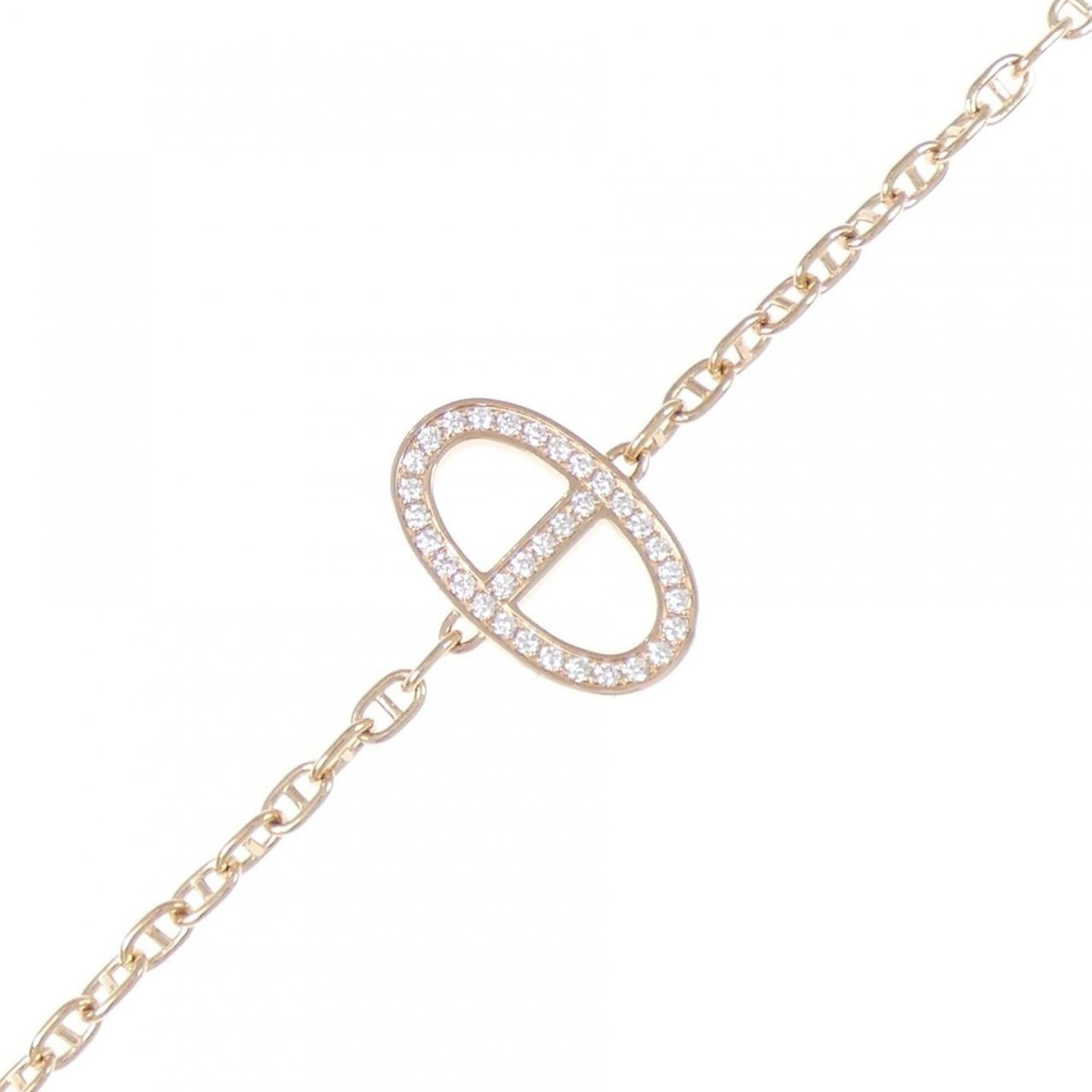 Pink Gold 18K Hermes Charm Bracelet: Pink Gold 18K Hermes Charm Bracelet Pink Gold 18K Hermes Charm Bracelet - A delicate, 16cm charm bracelet crafted from high-quality pink gold (18K) features a subtle diamond stone. With only a few tra