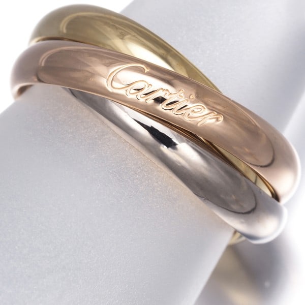 Cartier classic rose gold yellow white 18k trinity ring eu56 3color.: Cartier classic rose gold yellow white 18k trinity ring eu56 3color. Cartier's classic trinity ring boasts a striking multi-tone design in 18k gold, featuring a harmonious blend of rose gold, yellow g