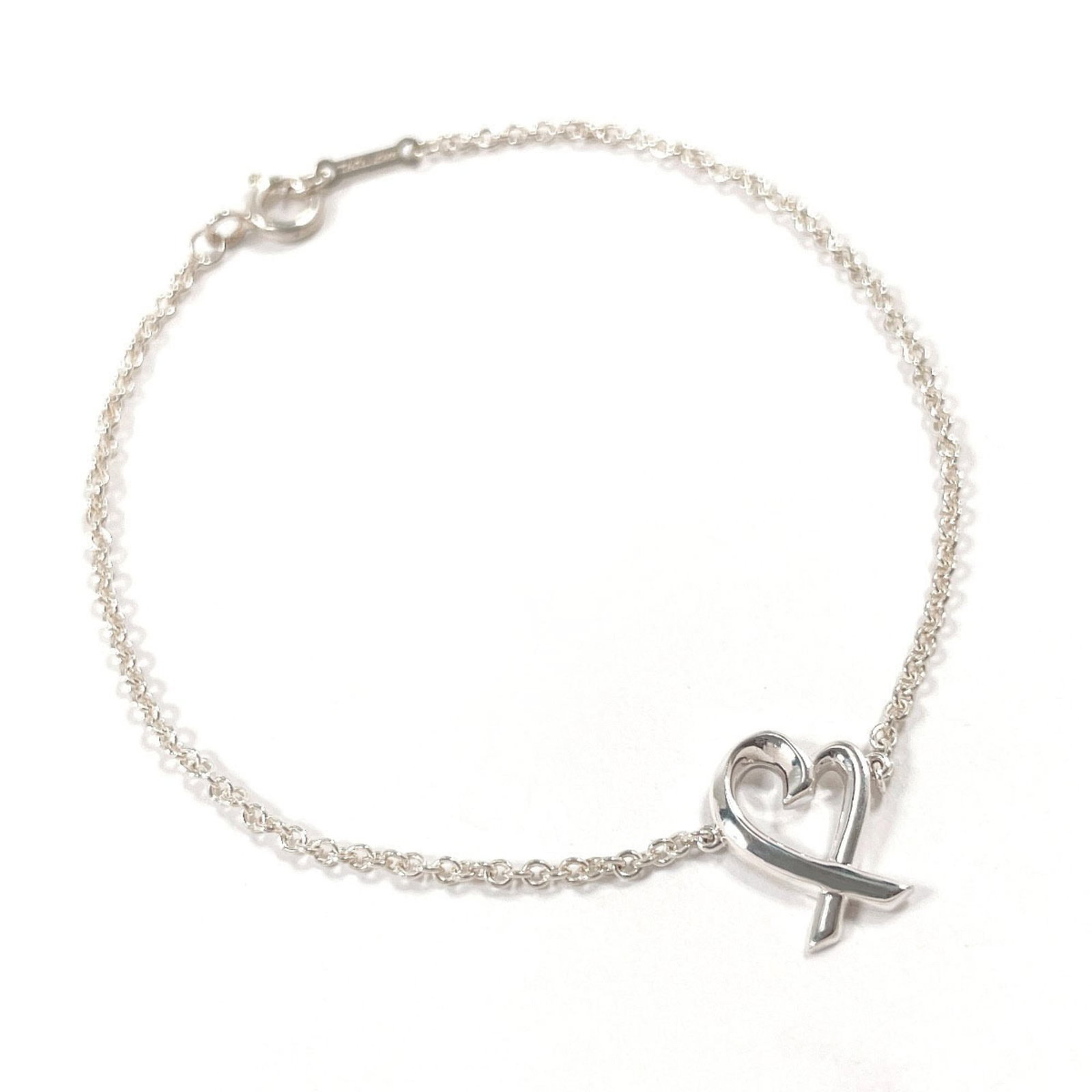 Charm Tiffany Bracelet 925 Silver: Charm Tiffany Bracelet 925 Silver Charm Tiffany Bracelet 925 Silver - A beautiful, silver charm bracelet in excellent condition. The 17.5cm length features a few traces of usage and some minor scratch